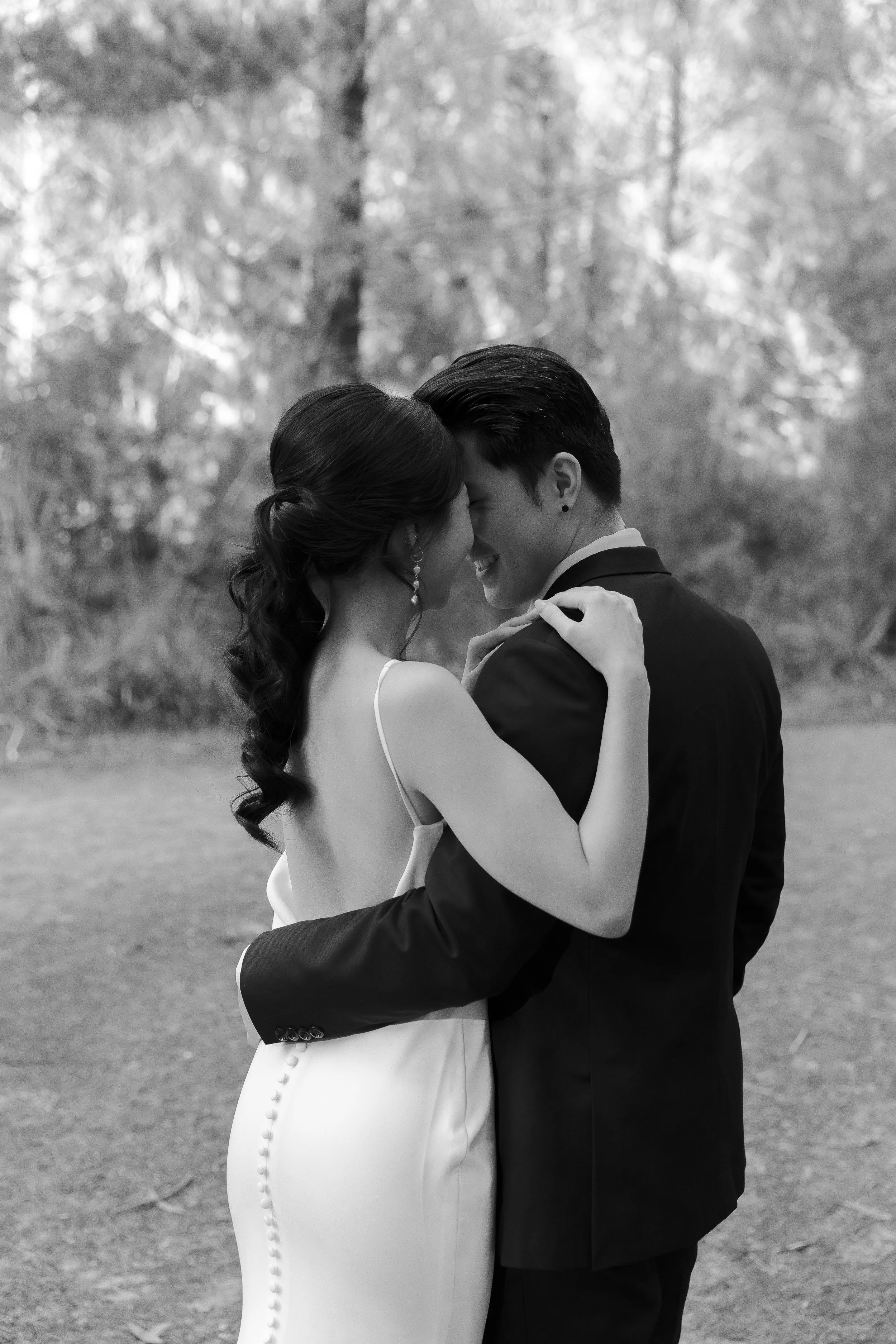 Bride and groom embracing