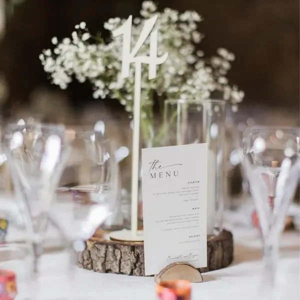 Midwest rustic details. How wonderful does simple earthy tree slices look with baby's breath and sleek glassware. 
Talk to us today about how we can help with signage and stationery details <3 

#rusticlove #weddingrentals #midwestweddings #dreamd