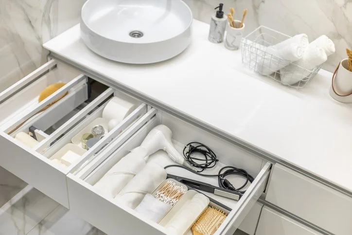 Bathroom vanity with open drawers