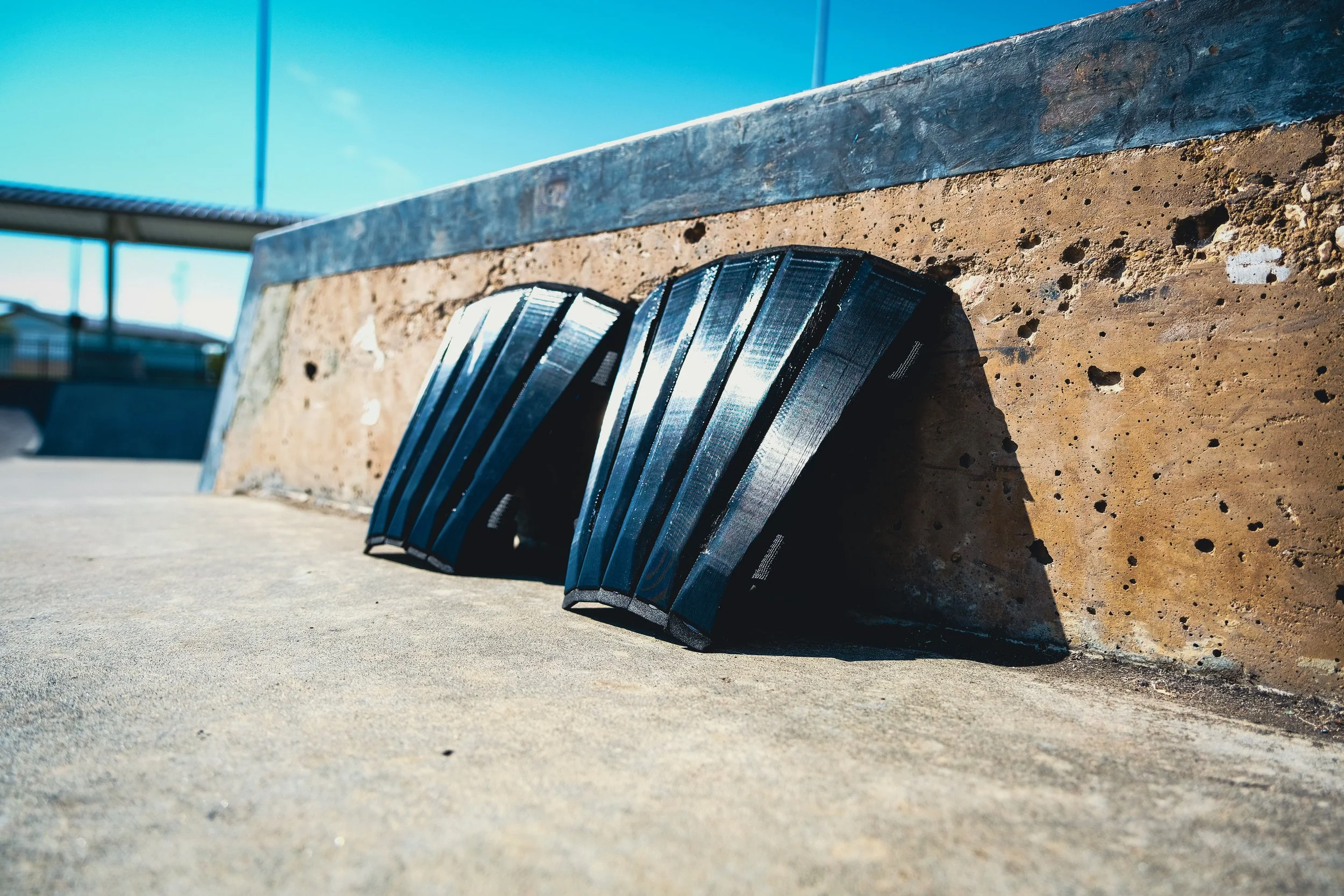 Suneate shin guards on display in the skate park