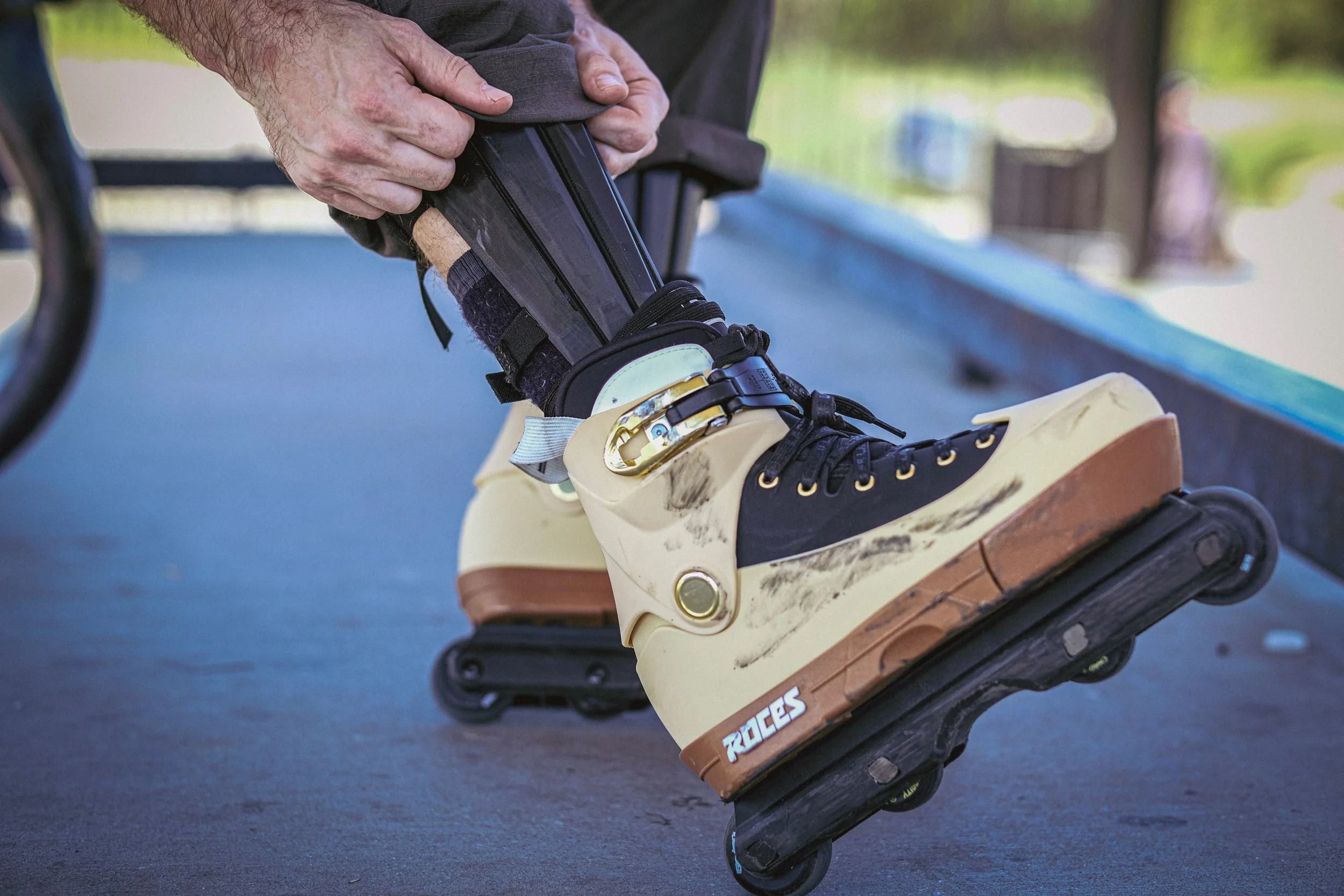 Showing off shin guard and skate set up