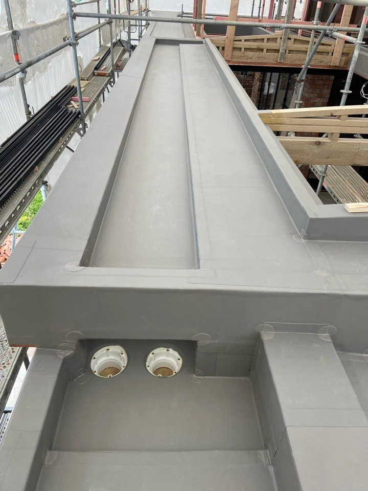 Viking TPO membrane roof on residential rebuild, St Heliers Auckland