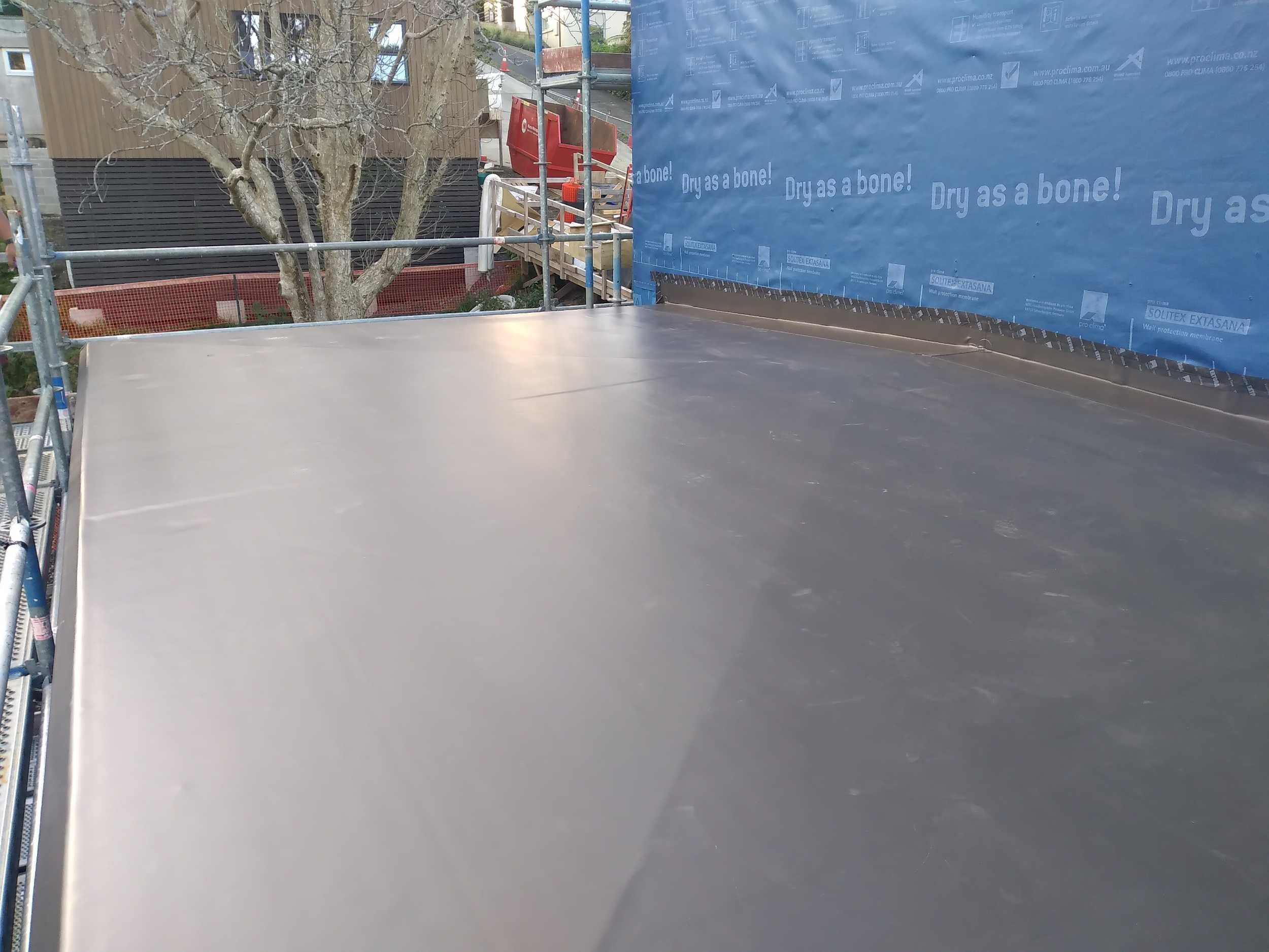 Viking TPO warm roof membranes on multi-area residential build, Northcote Auckland