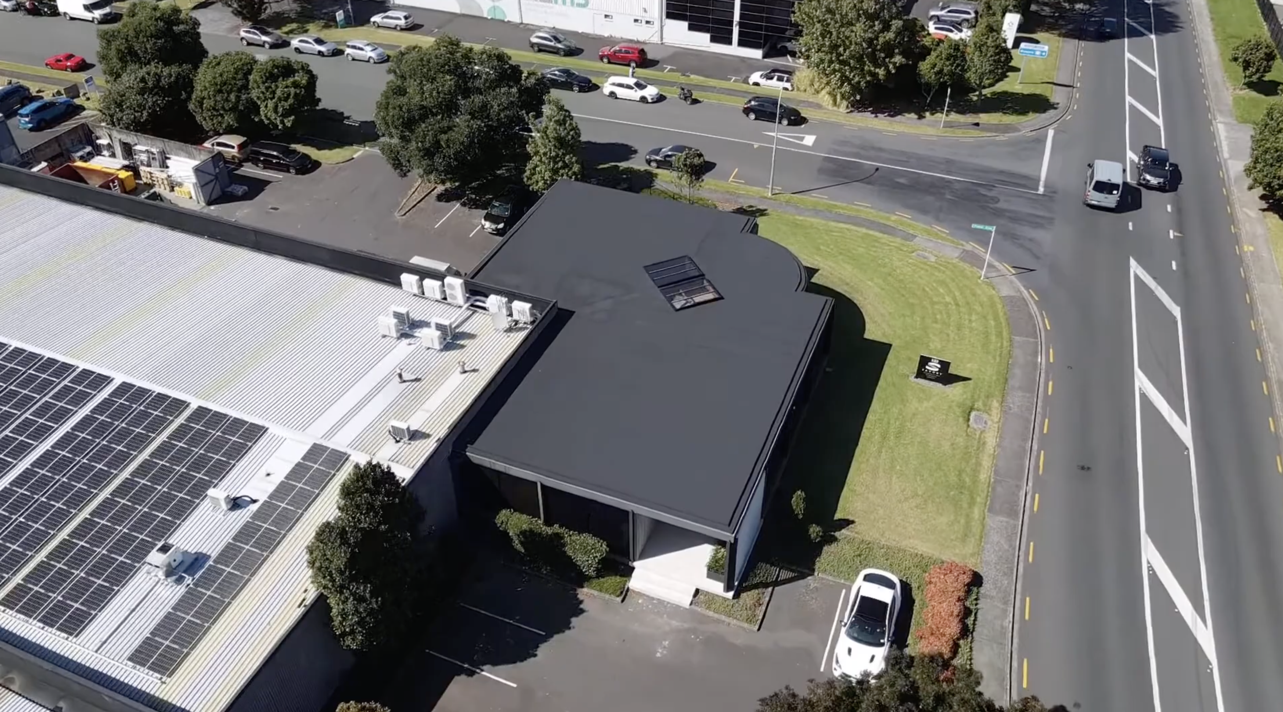 Nuraply 3PM remedial membrane roofing installation at Savory Construction head office, Mt Wellington, Auckland