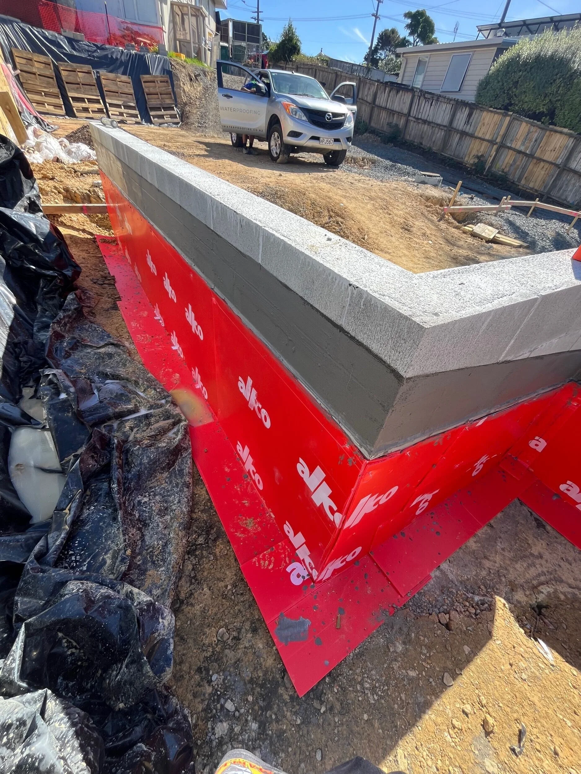 MPM Waterproofing team on new residential build site, joint sealing and foundation waterproofing, Auckland