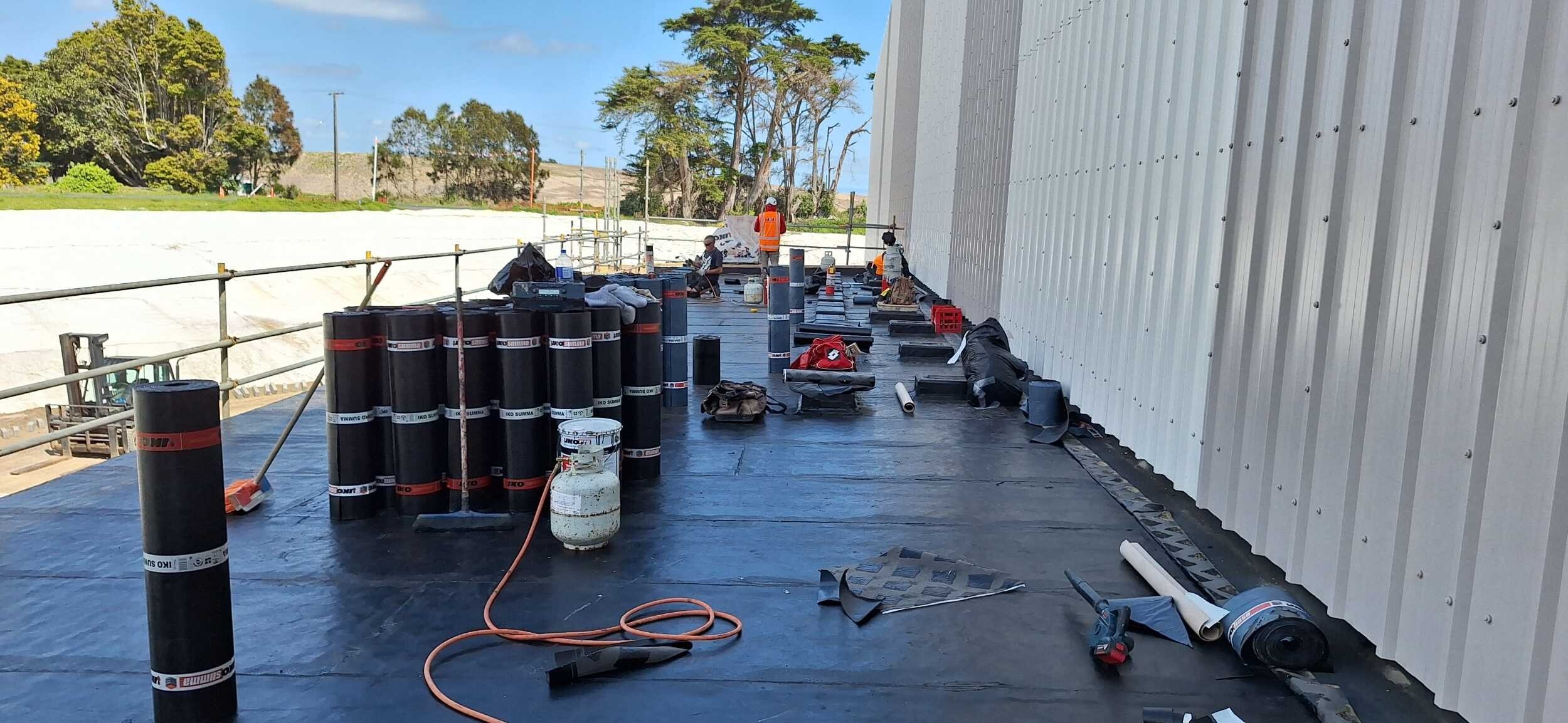 MPM Waterproofing torch-on membrane roofing installation at coastal Auckland site