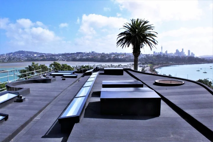 Membrane waterproofed podium and roof terrace, high-end residential development, Paratai Drive Orakei Auckland