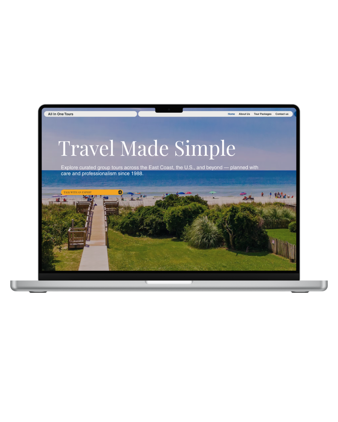 Screenshot of a home renovation company's website homepage featuring a modern kitchen with white cabinets, a large island, and pendant lighting. The website slogan reads 'Designed for Life' with a subtext about building homes with a feminine touch and a call-to-action button for booking a consultation.