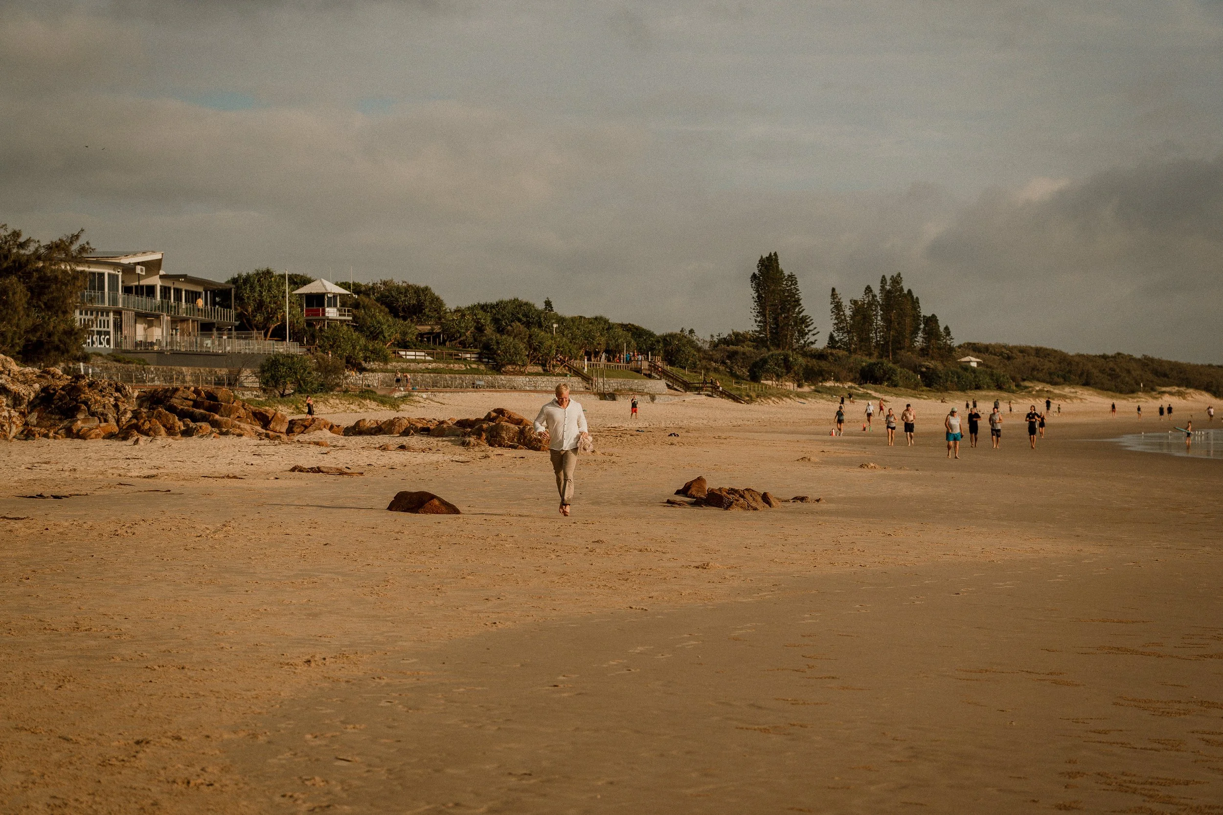 Groom runs back for forgotten items during elopement in Coolum Beach
