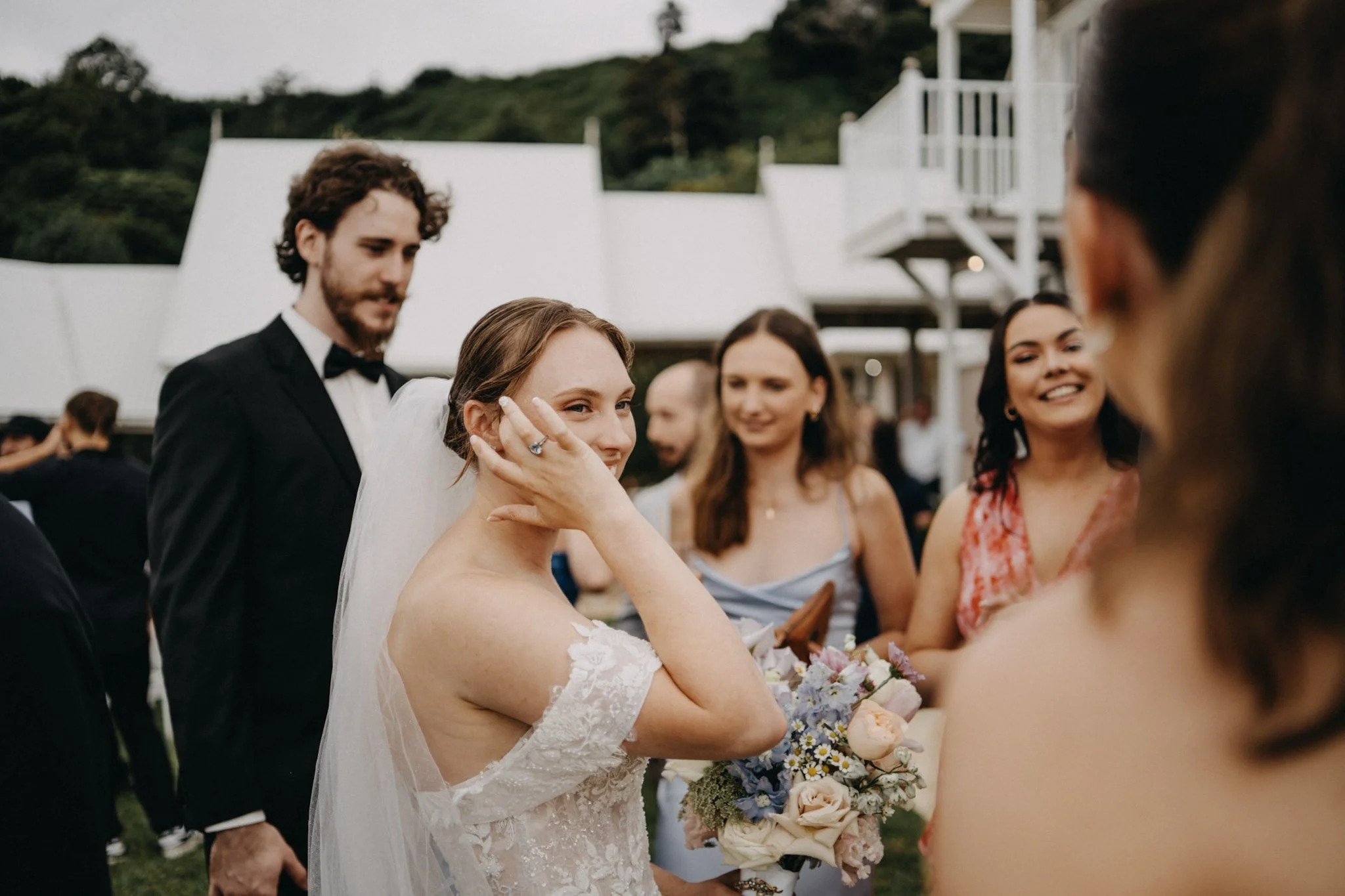 Candid portrait of bride celebrating after her vows in Maleny