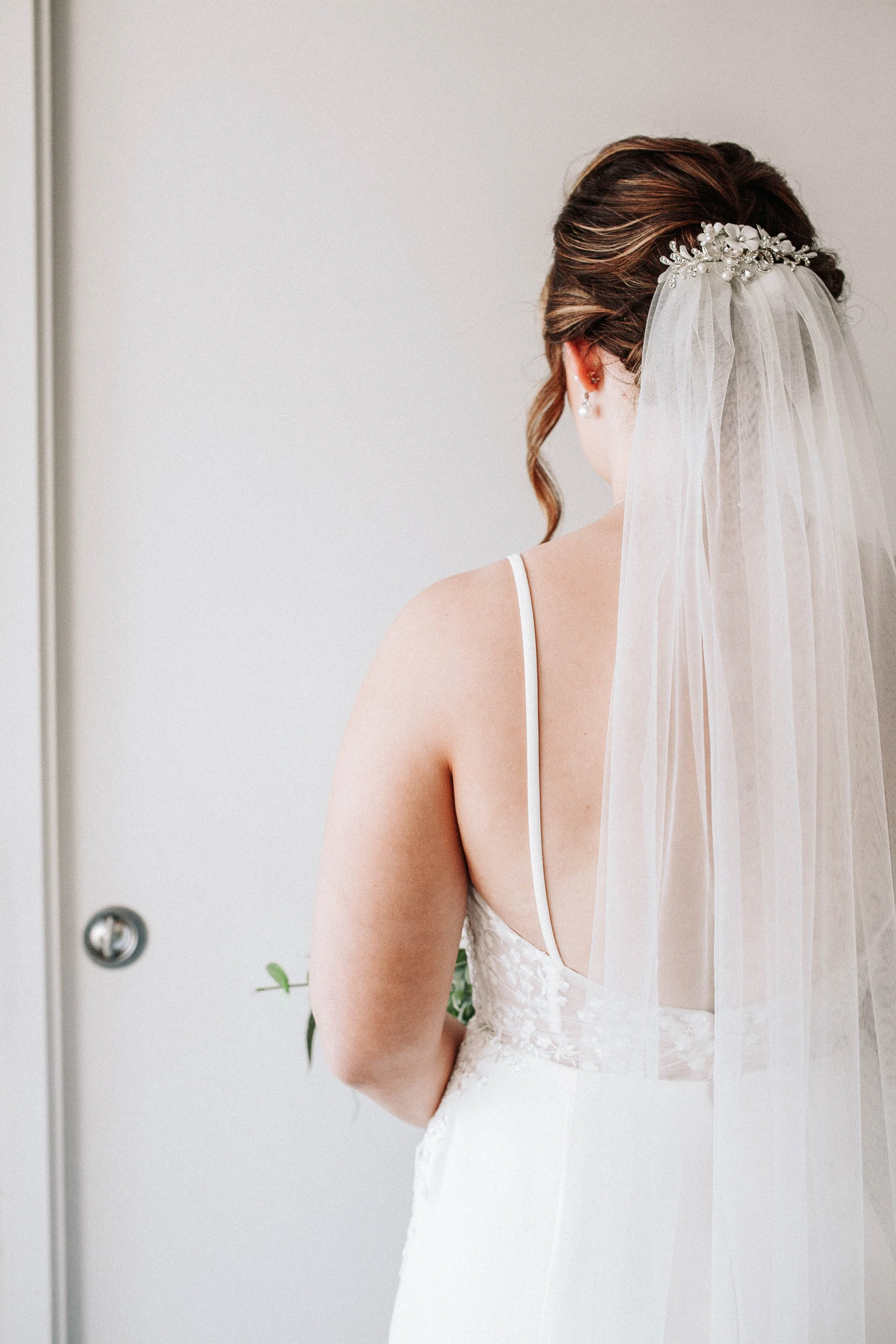 Bride awaits first look behind closed door in Yeppoon