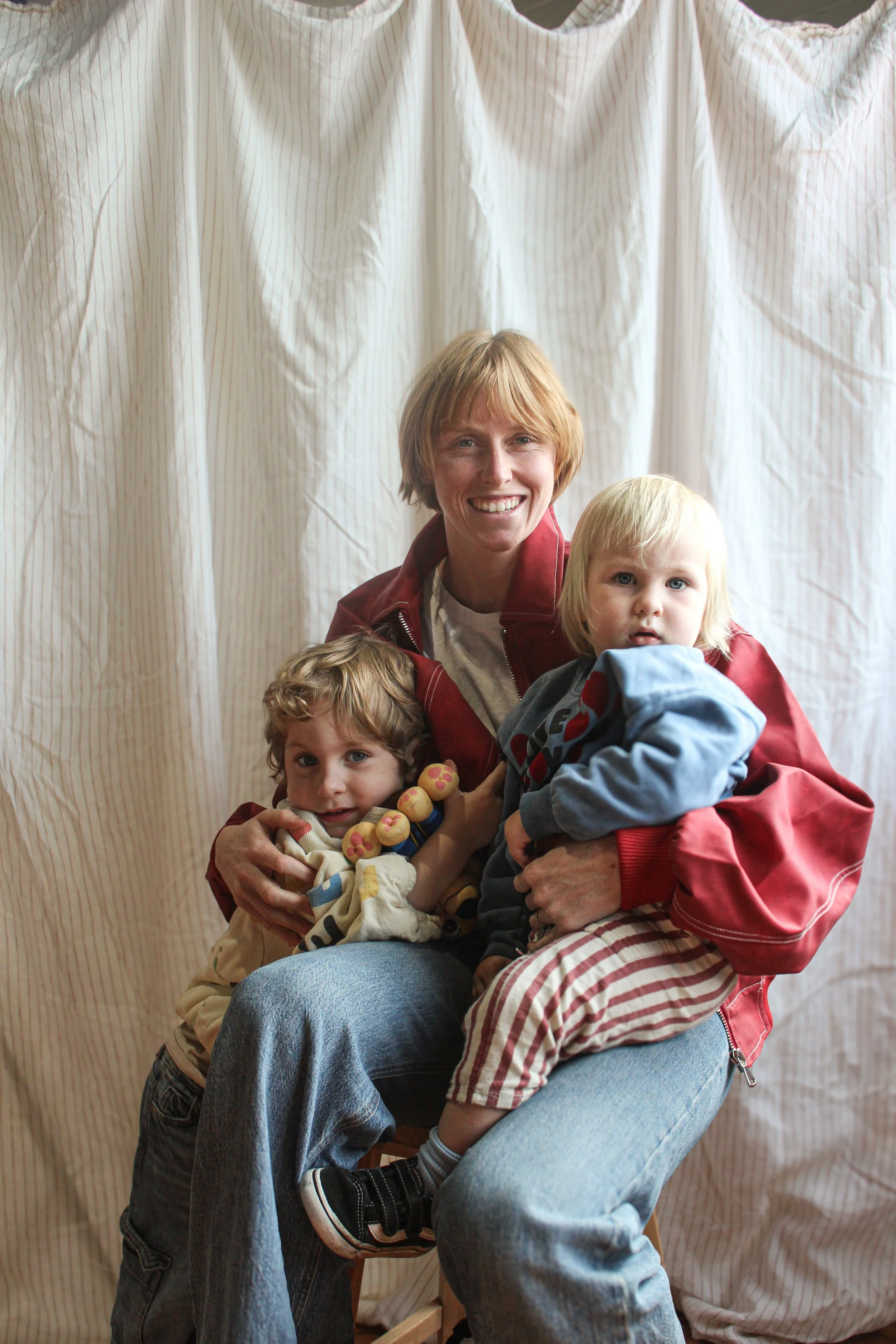 A doula and mother with her two children