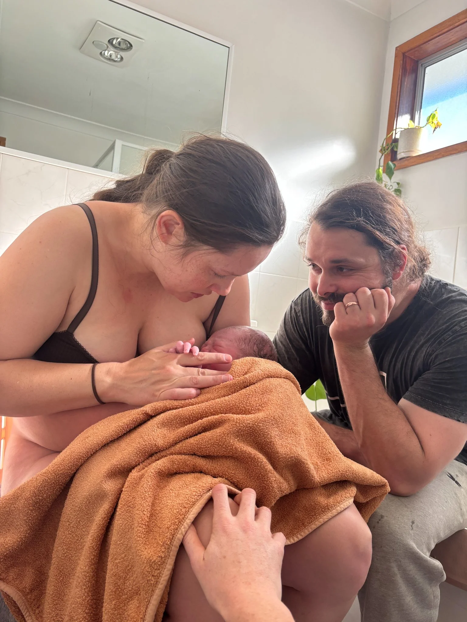 Newborn mother and newborn baby, postpartum