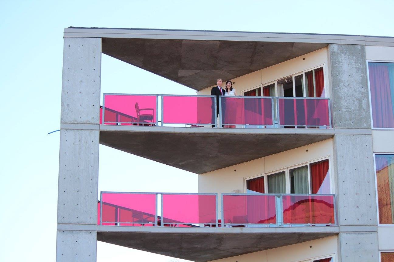 Laurie’s customers, Larissa and Emmett, just married walking off the aisle together.