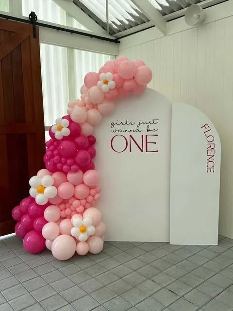 Arched Backdrops at Sublime Social, Clarence Park. Decals reading 'girls just wanna be ONE' & 'Florence' by Nutmeg Creative. Balloons, Daisies and Photo by Quay Creative. Sublime Café & Catering, Adelaide.