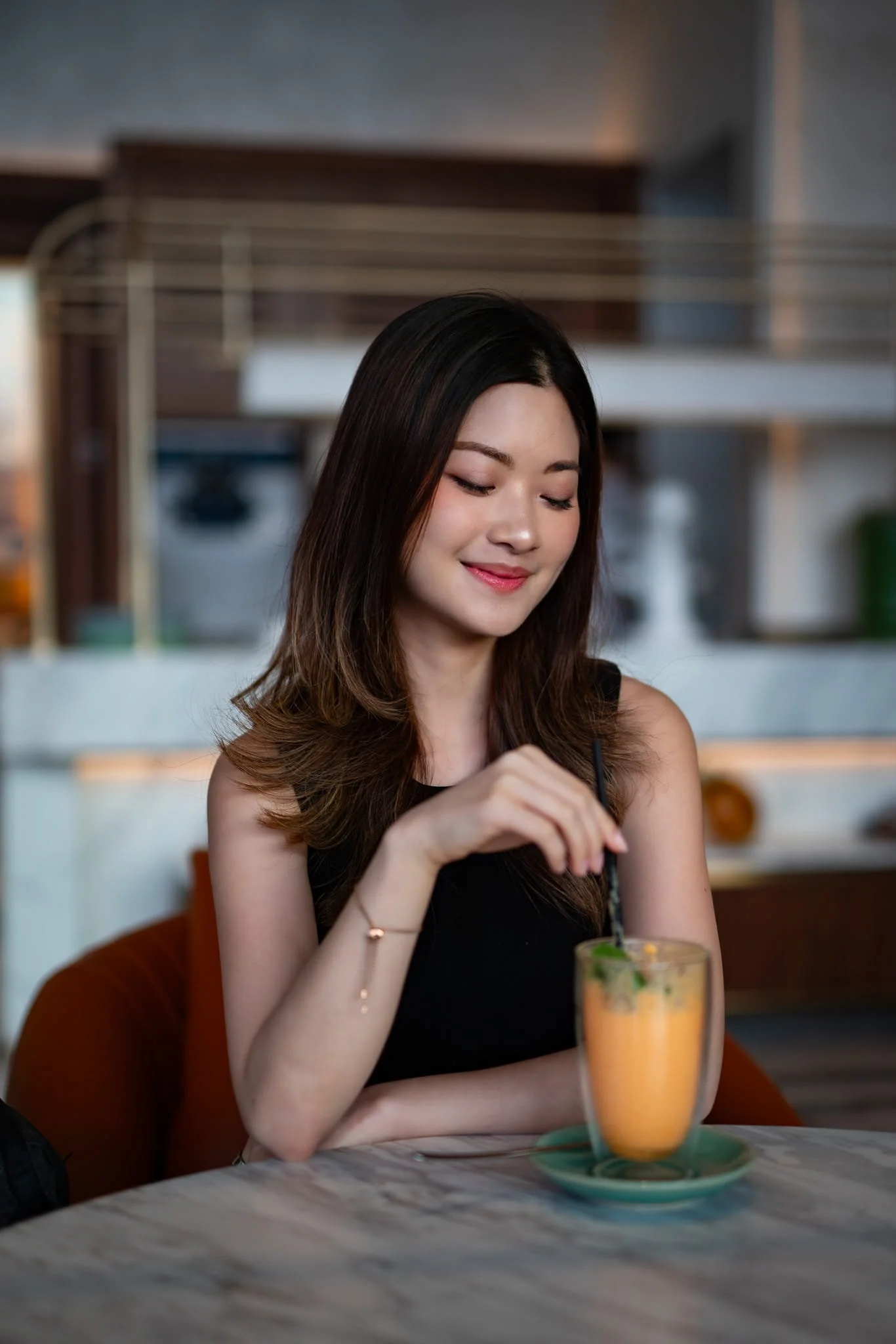 bangkok-lifestyle-photoshoot-woman-stirring-drink-photographer.jpg