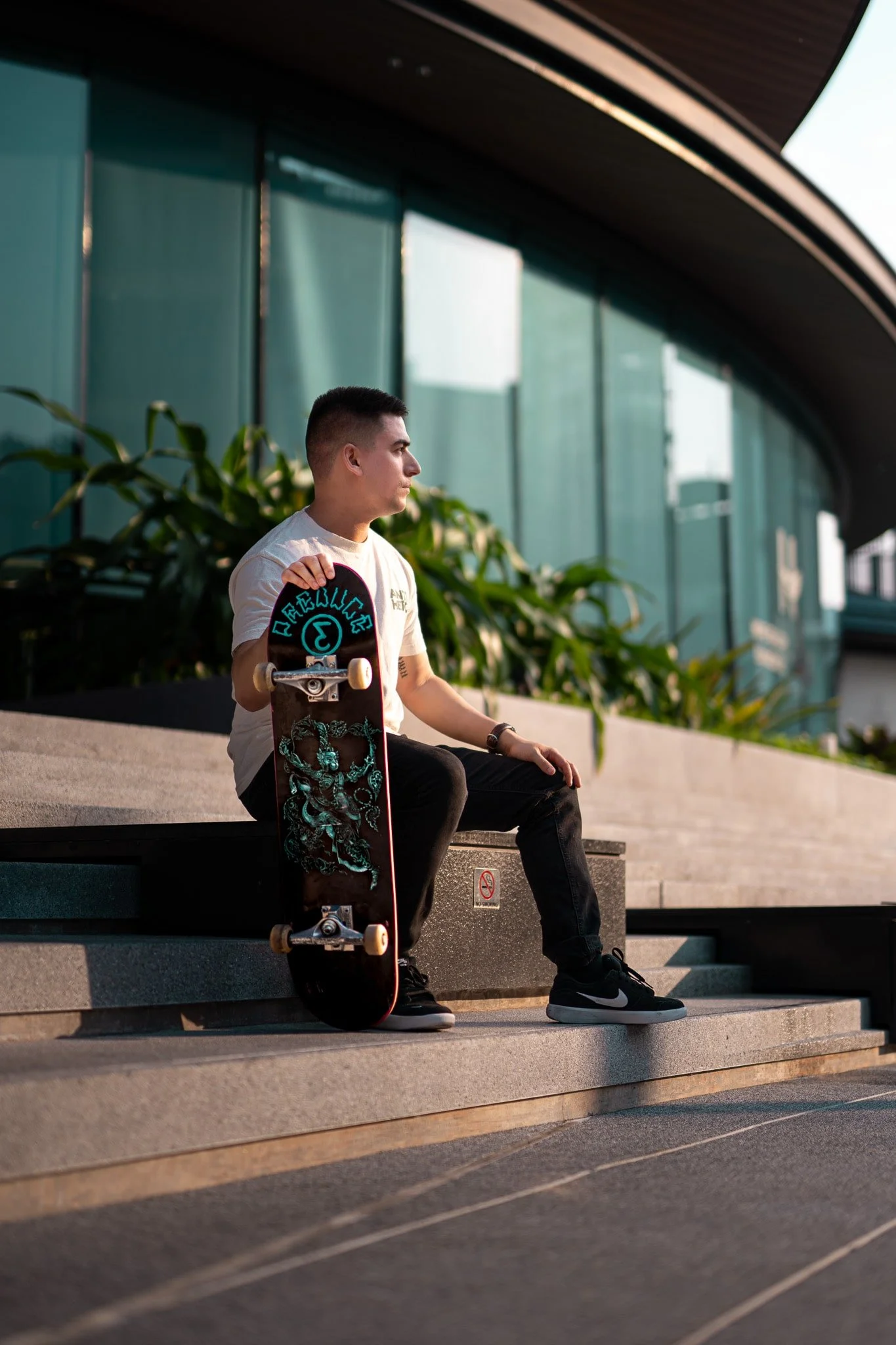 bangkok-lifestyle-photoshoot-skateboarder-checking-phone.jpg
