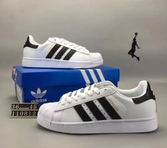 superstar white black gold lettering.png