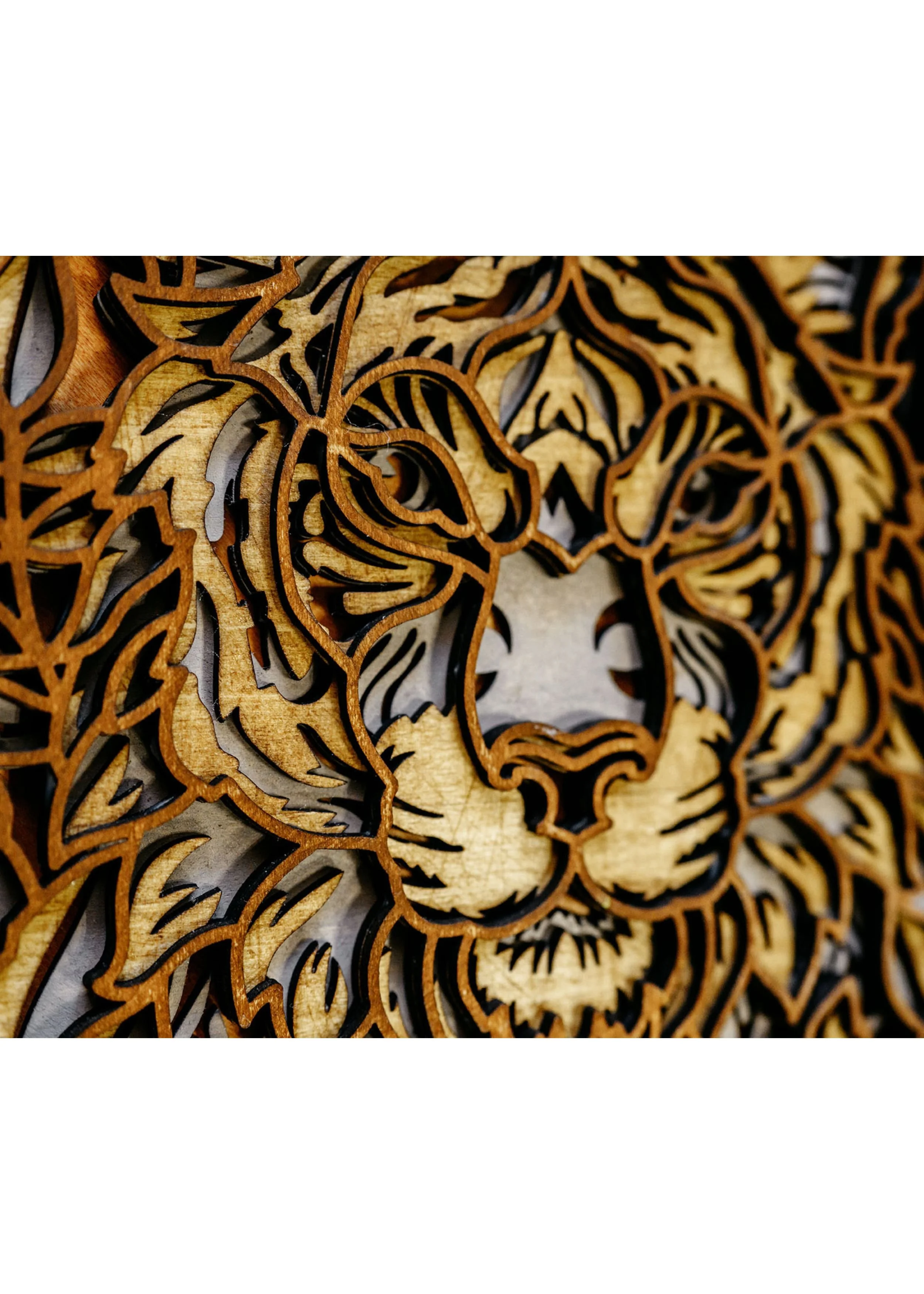 Thickness and depth of layered lion mandala wood wall art with ruler for scale