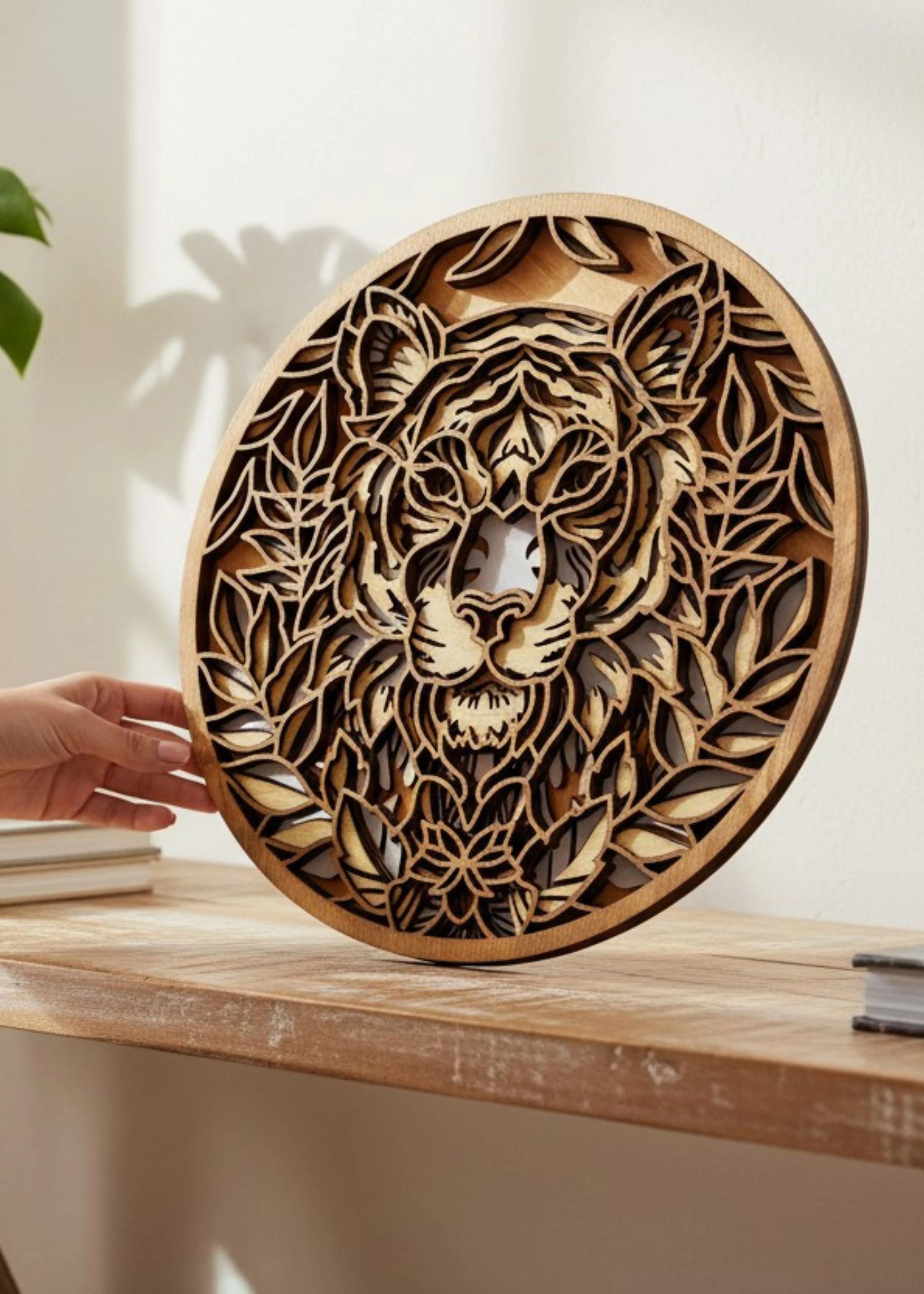 Layered lion mandala wood wall decor showing depth and stacked basswood layers
