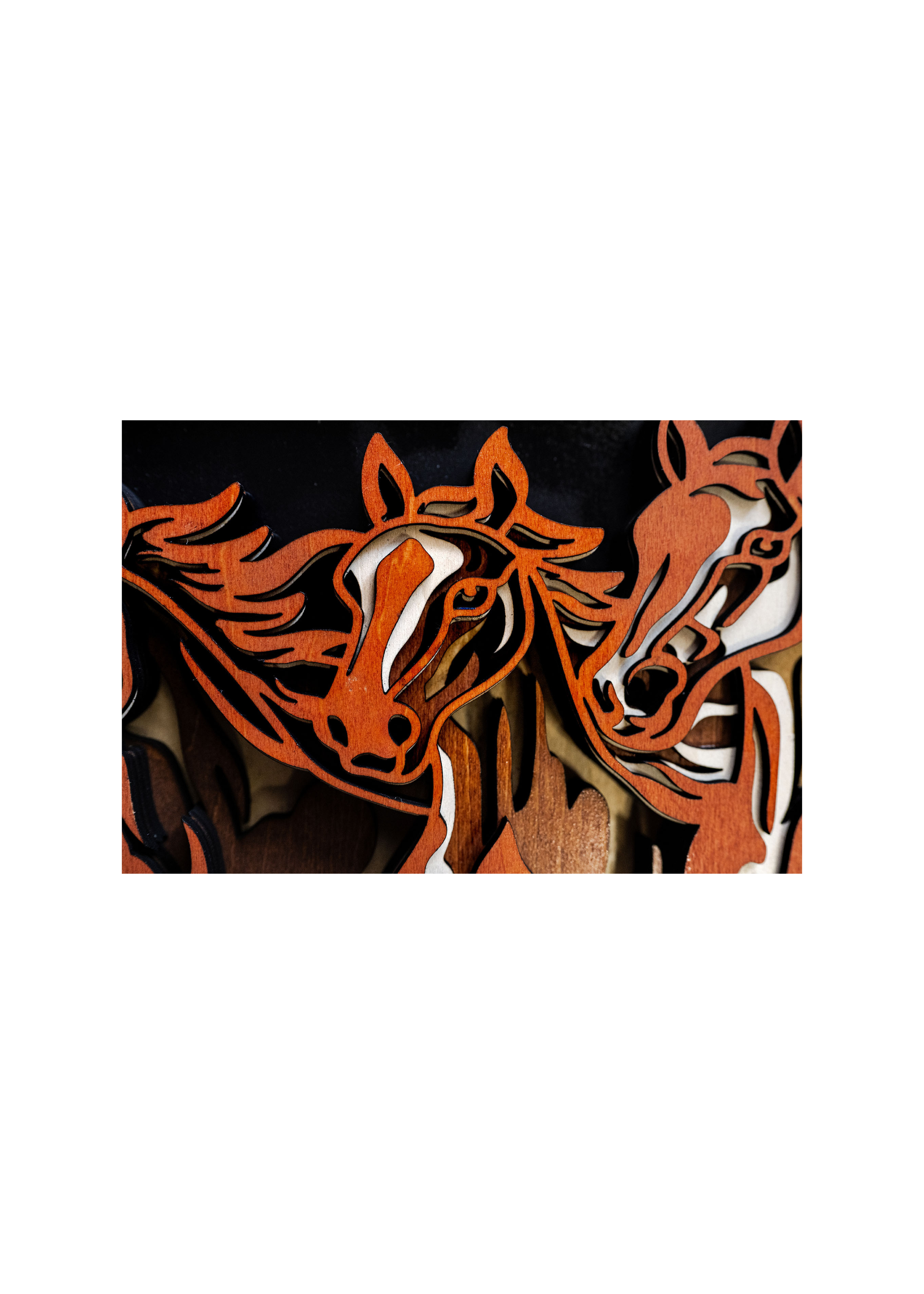 Layered wood equestrian wall art detail