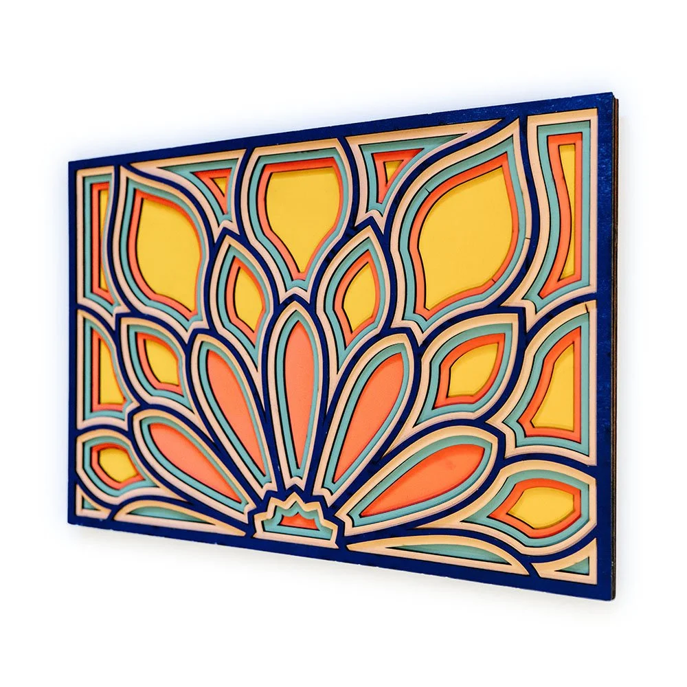 Close-up of layered flower petal burst wall art showing precise laser-cut petal details and dimensional wood layers