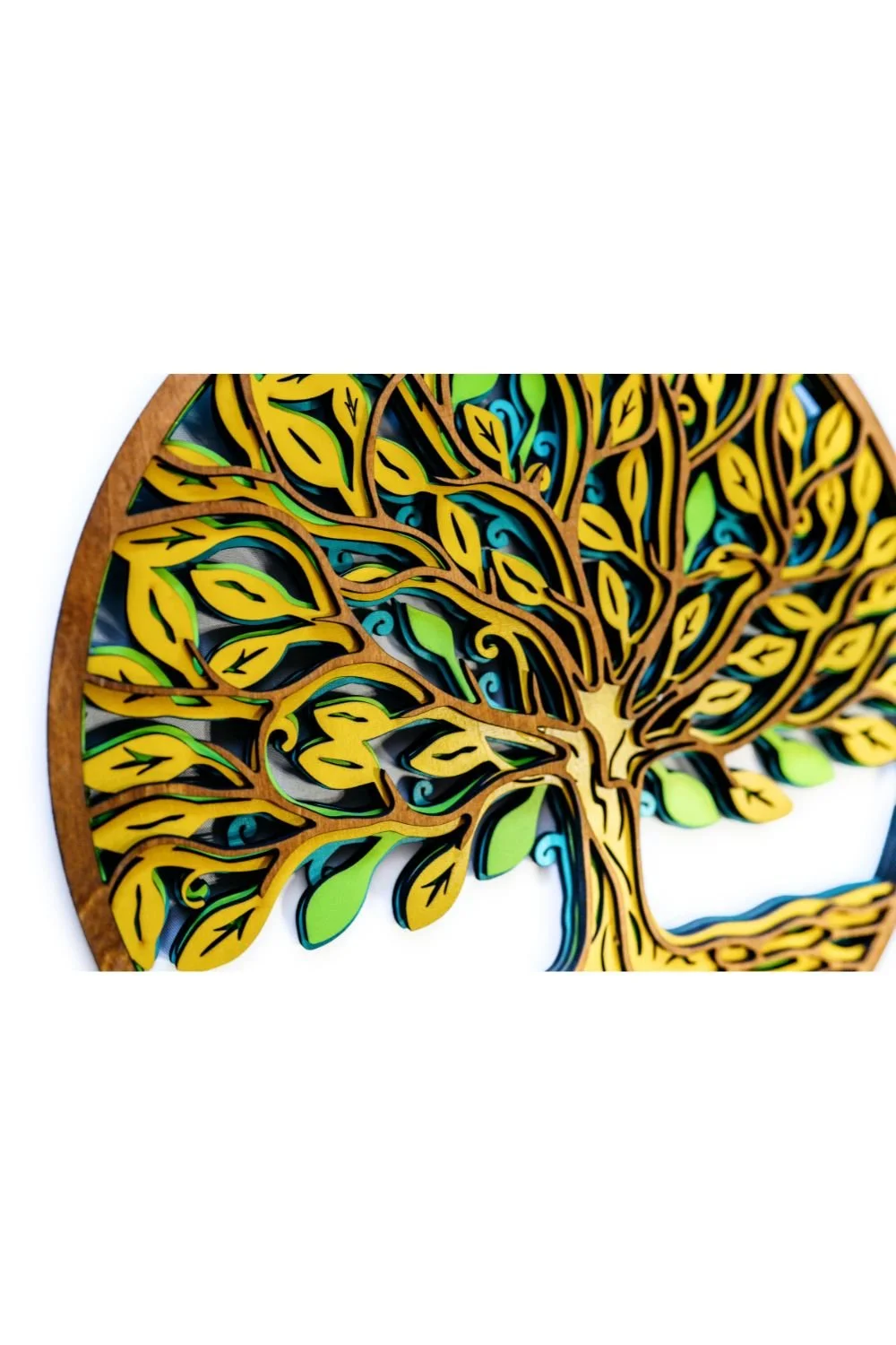 Close-up of Tree of Life wood wall art showing precise laser-cut details and smooth wood finish