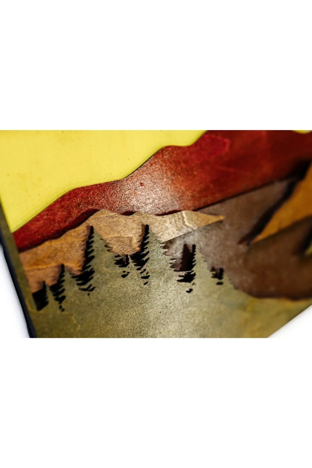 Detailed view of mountain peaks and layered terrain emphasizing depth, balance, and craftsmanship.