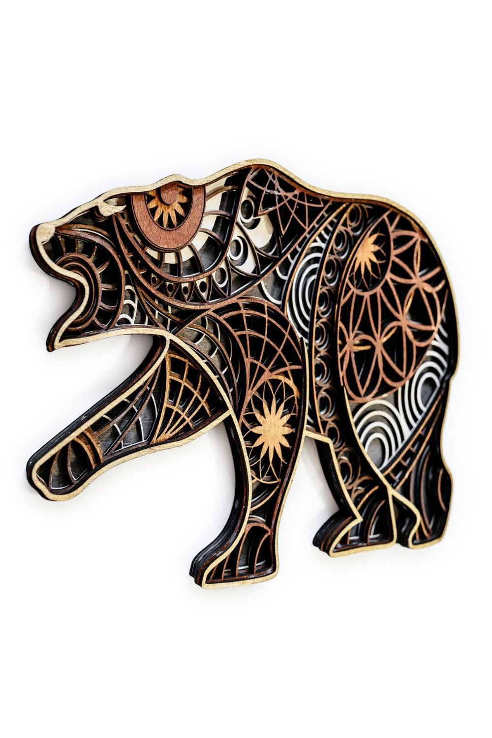Angled view of bear mandala wood wall art showing layered depth and precision-cut mandala details.