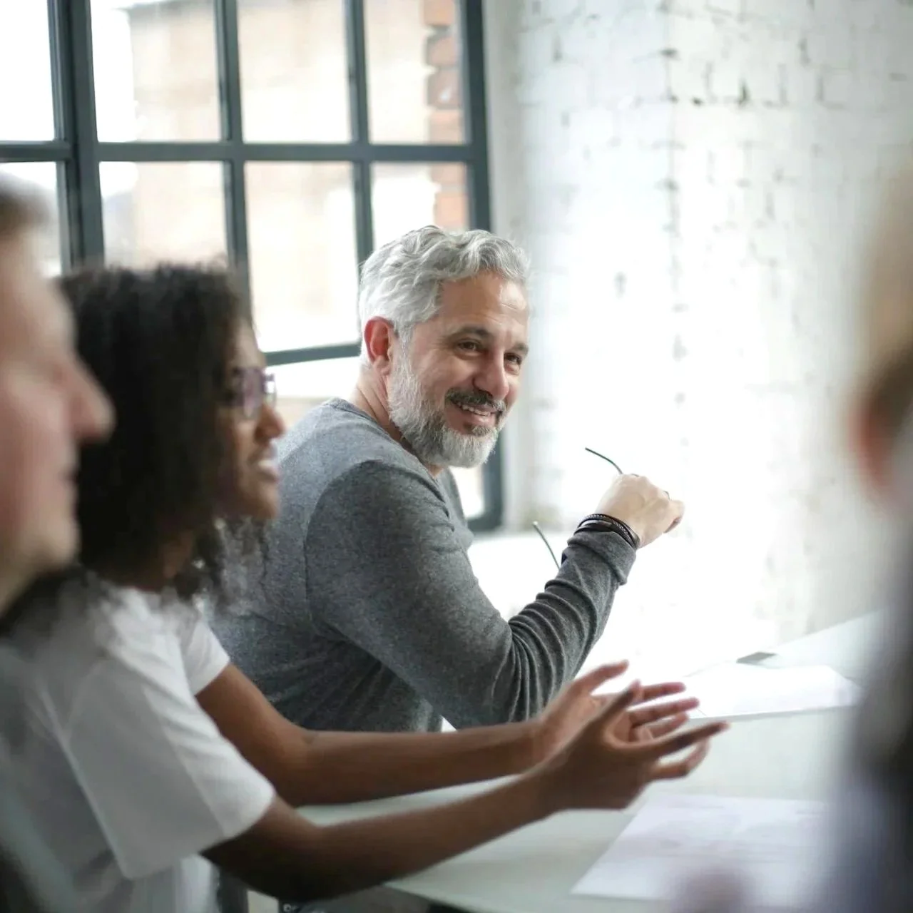Small group discussion representing ADHD group therapy and support programs