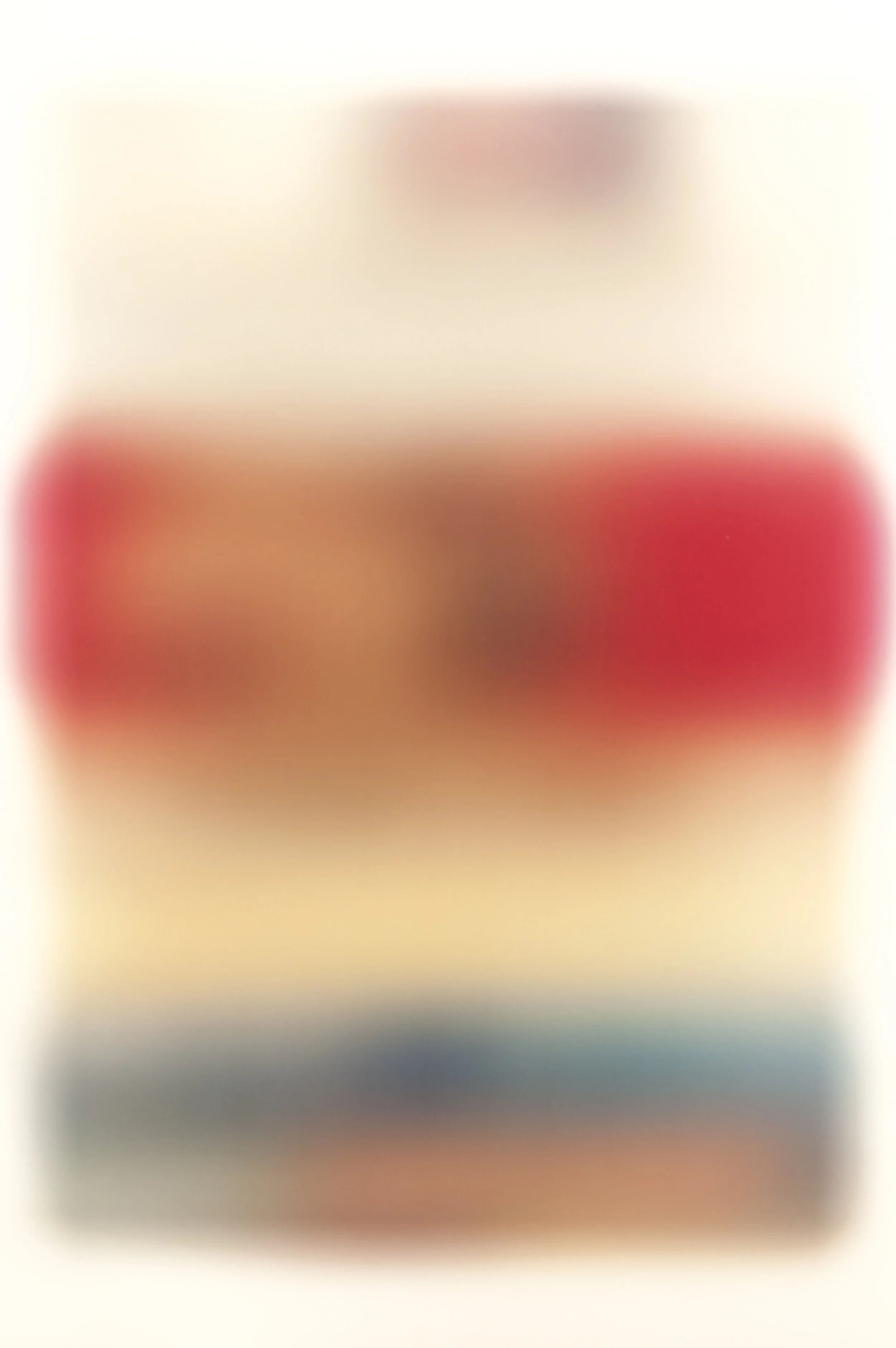 A blurred image with no distinguishable objects or details.
