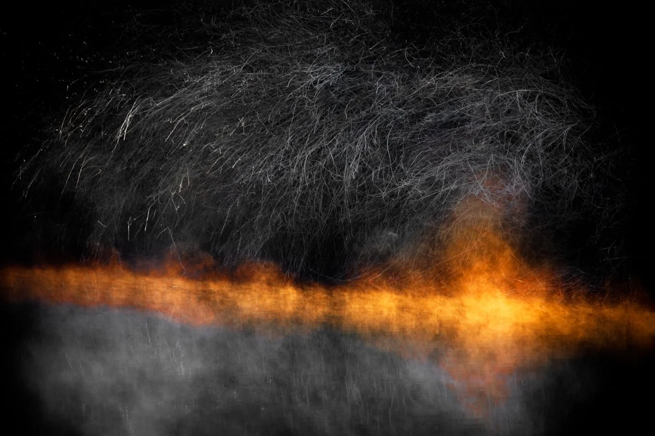Light hits steam rising off the Maribyrnong River photograph by Christian Pearson