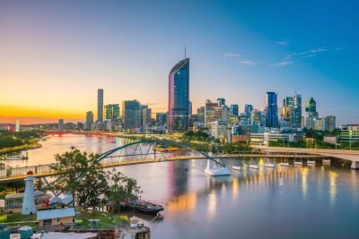 Brisbane city scape with bridge and boats in the river