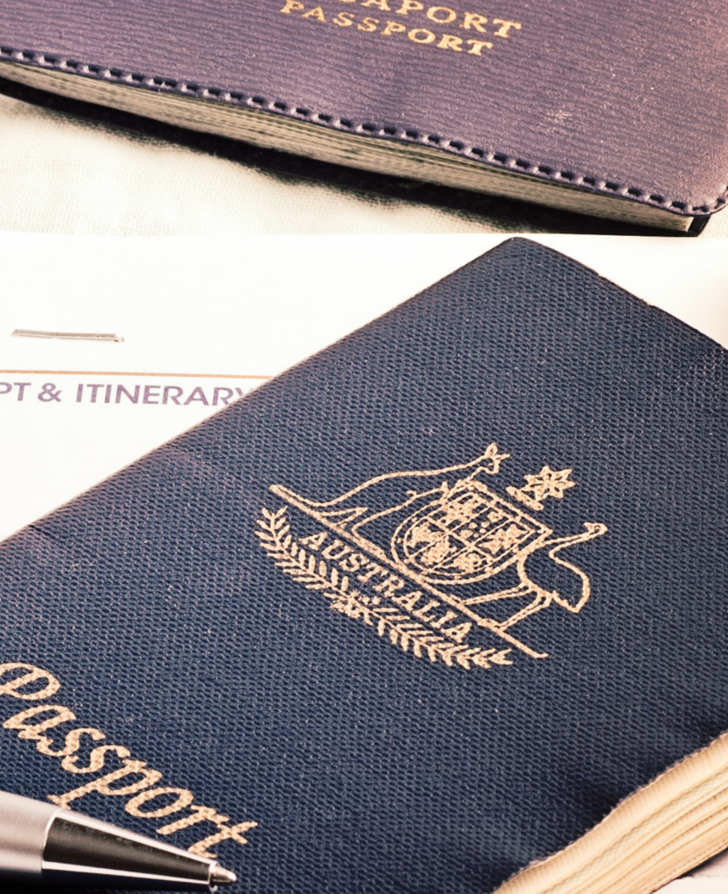 Close-up of a closed purple passport with yellow lettering on it. The passport rests on a textured dark blue fabric, with a beige cloth underneath. – Olympus Migration | Andreas Athanasiou