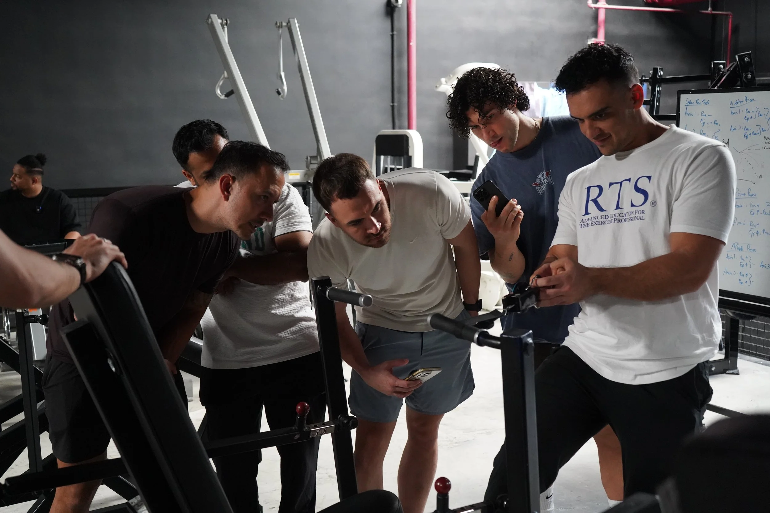 Benny Price using a resistance scale to measure the output of a machine during an RTS Level 2 course in Dubai, UAE