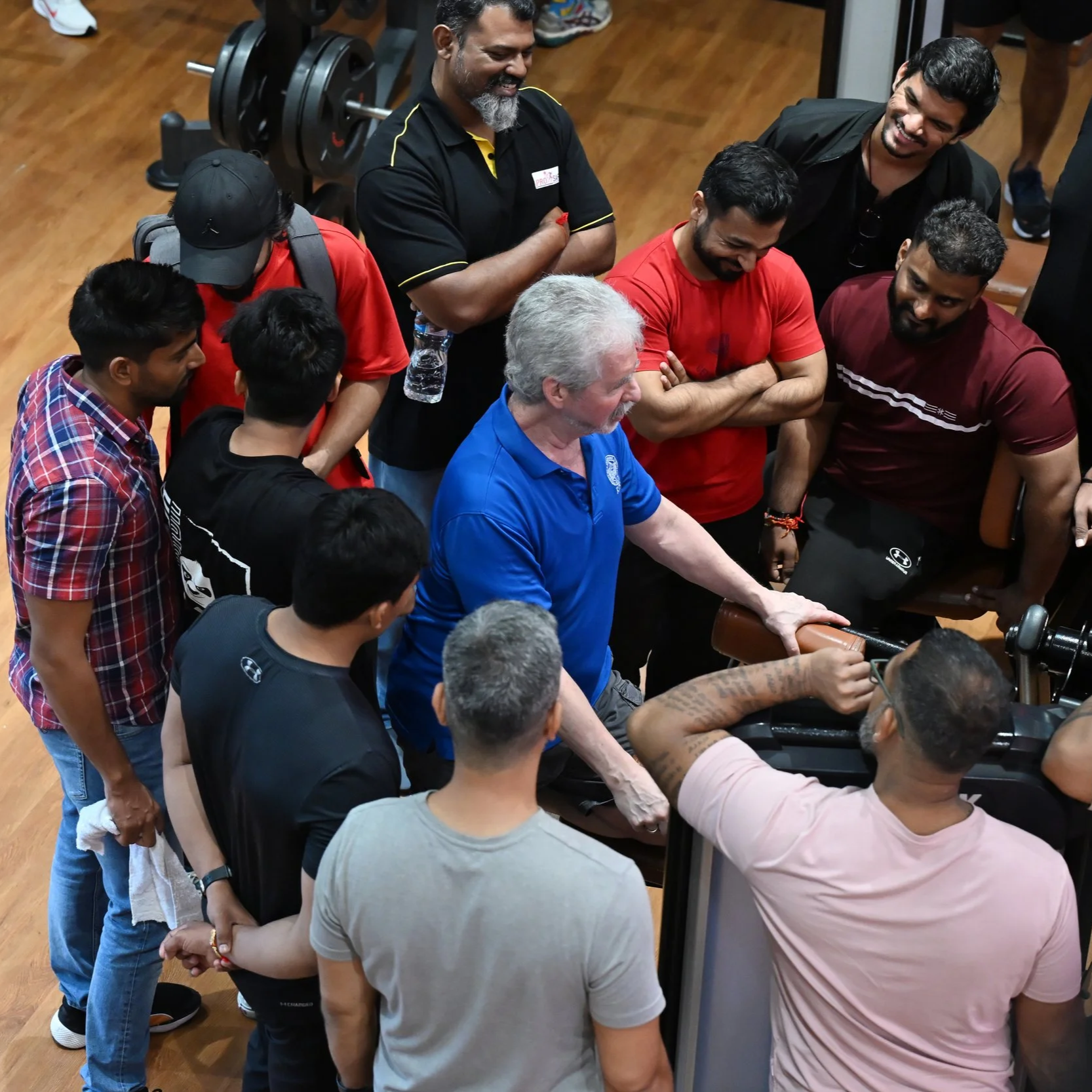 Dr Mark Slavin discussing the nuance of using trunk rotation exercises during a practical seminar in Mumbai, India