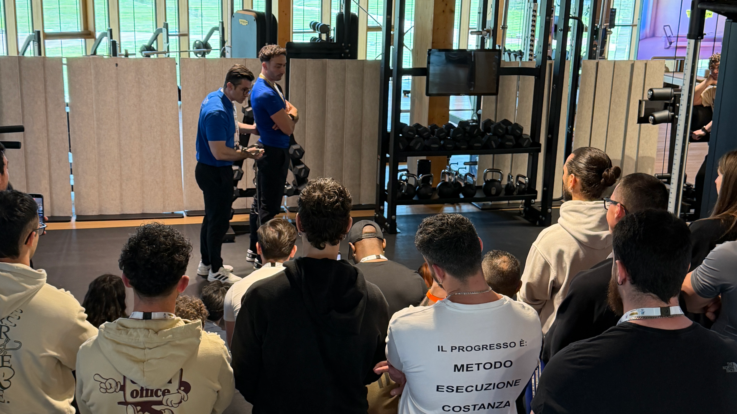 Dr Andrea Mariani demonstrating the considerations of squat mechanics during an RTS Level 1 course in Italy