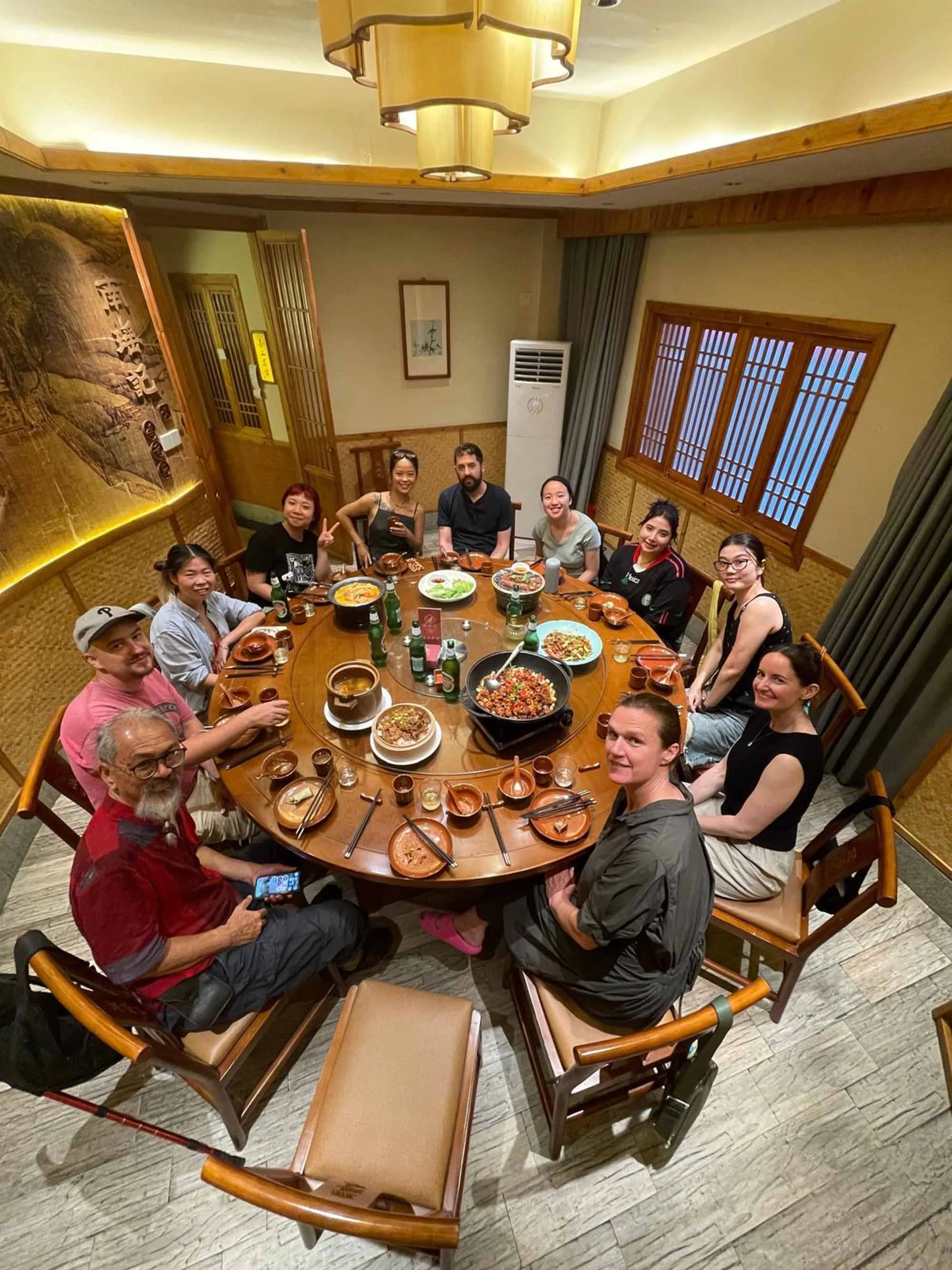 Helen Johannessen and international artists dining together in Jingdezhen, China.