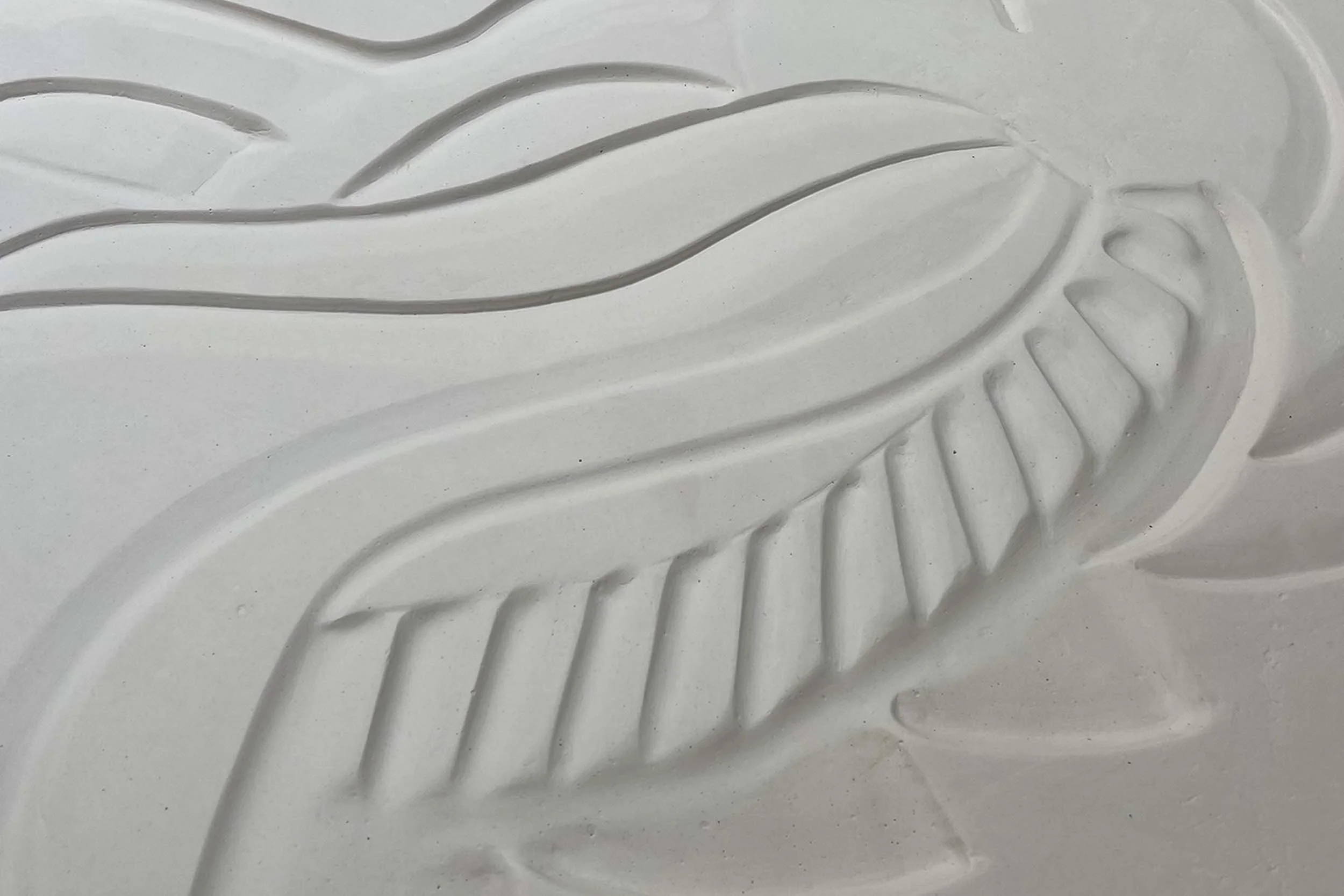 Detail of carved plaster surface from the Montcalm Mayfair Hotel artwork.