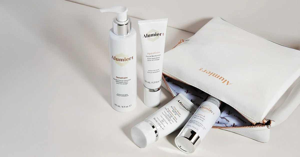 AlumierMD medical-grade skincare products displayed in the Natasha Holden Aesthetics clinic.