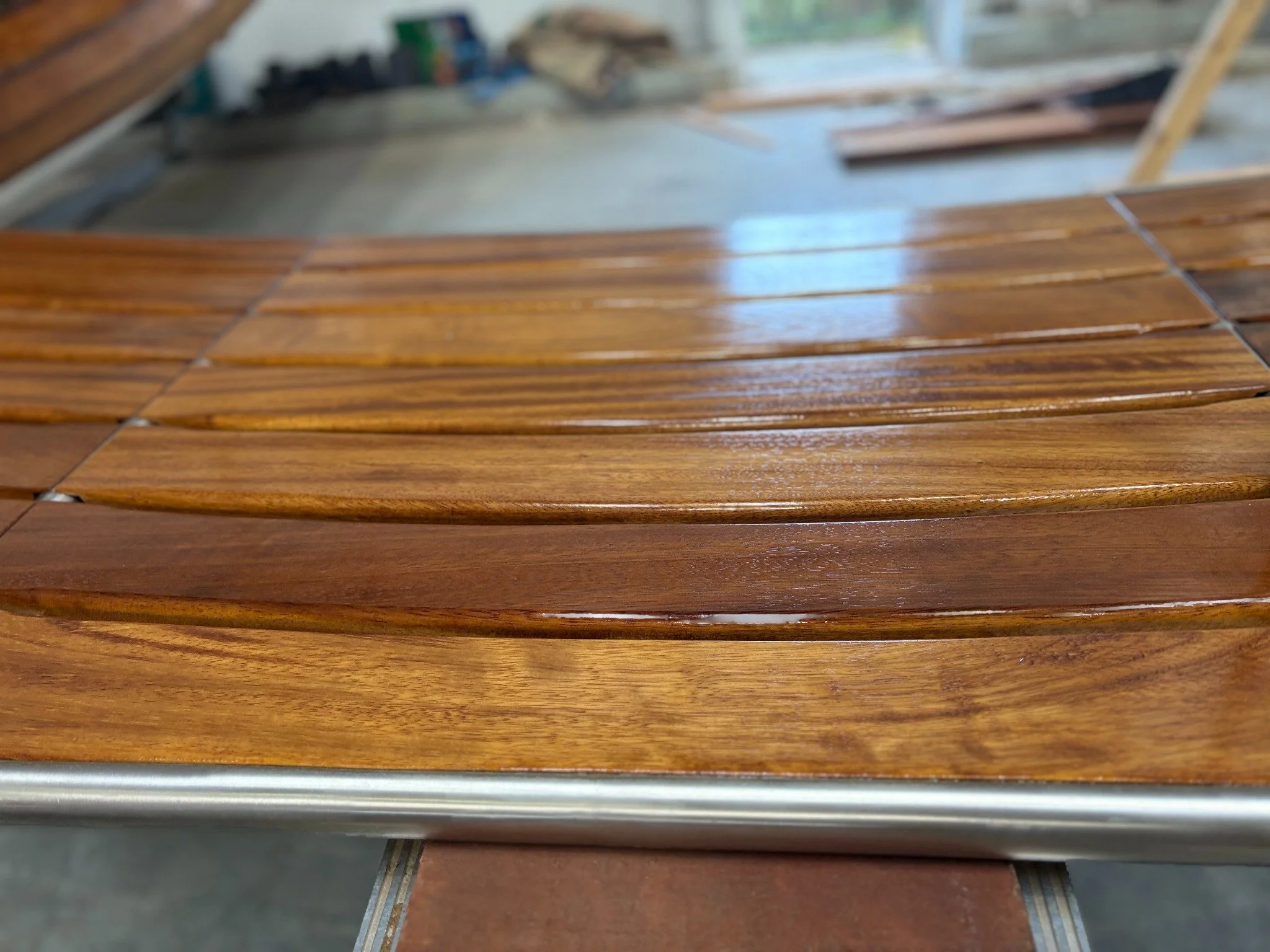 Close-up of the finished timber boards and joints on a custom swim platform
