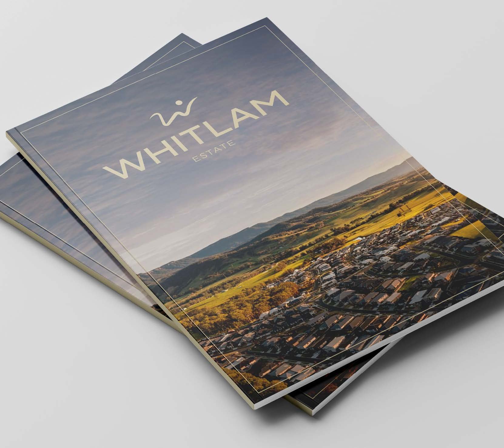 Brochure or booklet for Whitlam Estate showing a panoramic view of a residential area with mountains in the background under a partly cloudy sky.