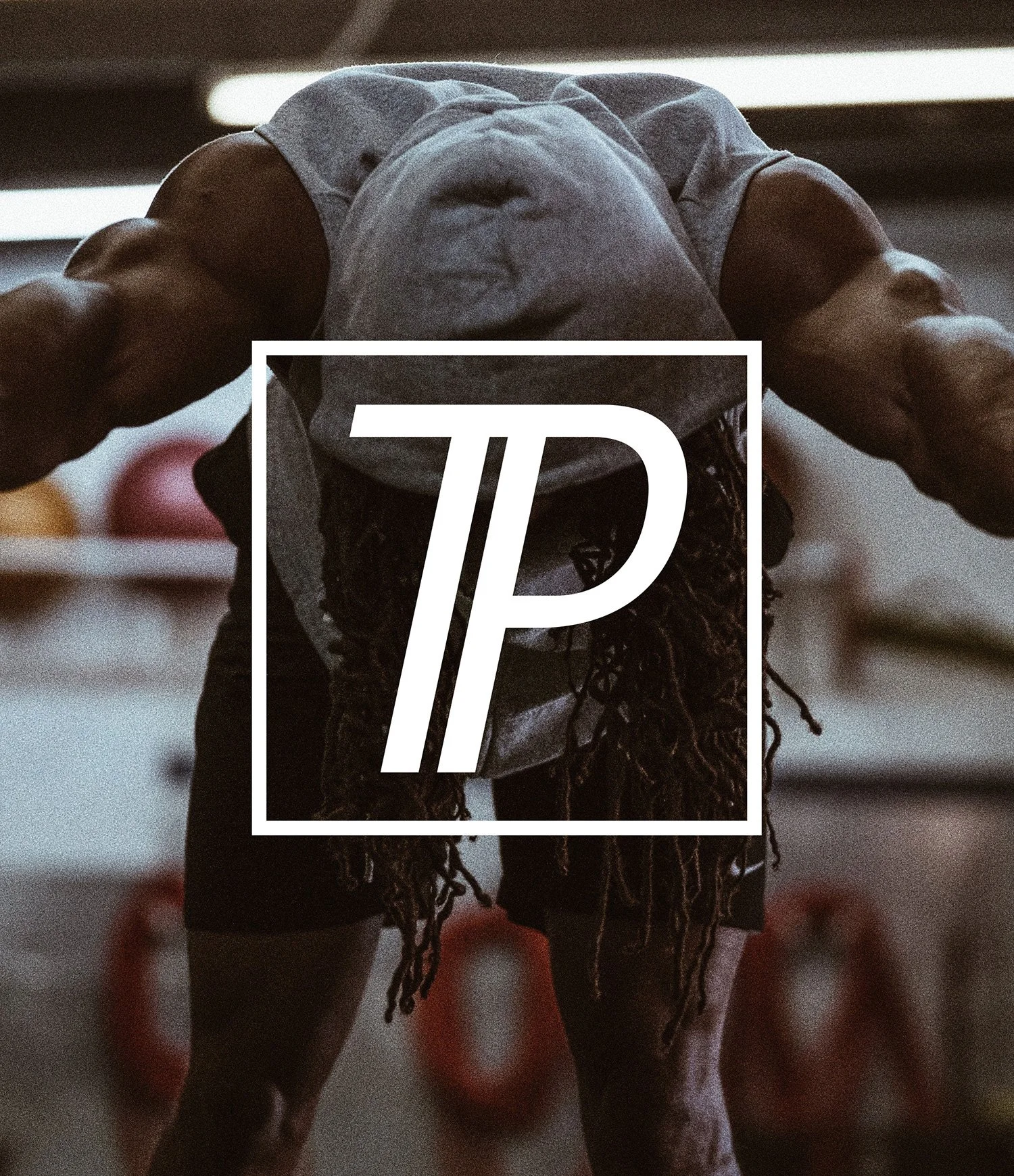A person with long dreadlocks doing a push-up in a gym, with a white logo featuring a large letter 'P' overlayed on the image.