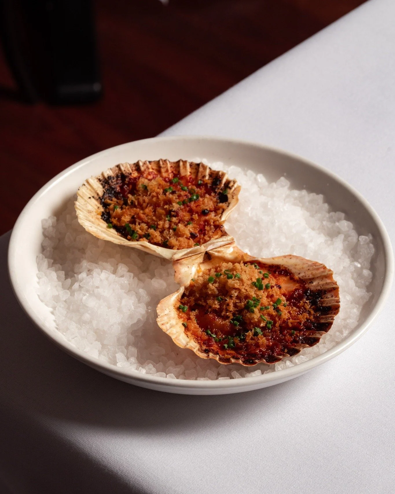 Don't forget we're open for lunch from 12pm today and tomorrow. Start off with a couple of these scallops with &rsquo;nduja butter &amp; pangrattato, and you're in for a very nice time.