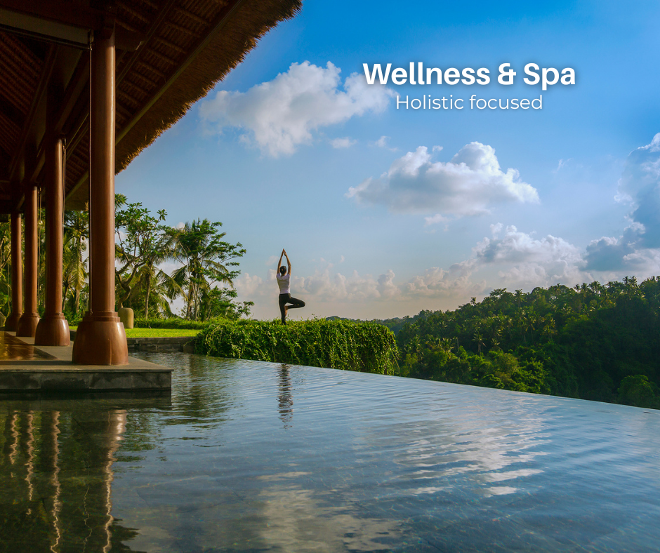 Spa and wellness experience at Mandapa, a Ritz-Carlton Resort Bali, featuring a serene infinity pool, lush tropical views, and a guest practicing yoga outdoors.
