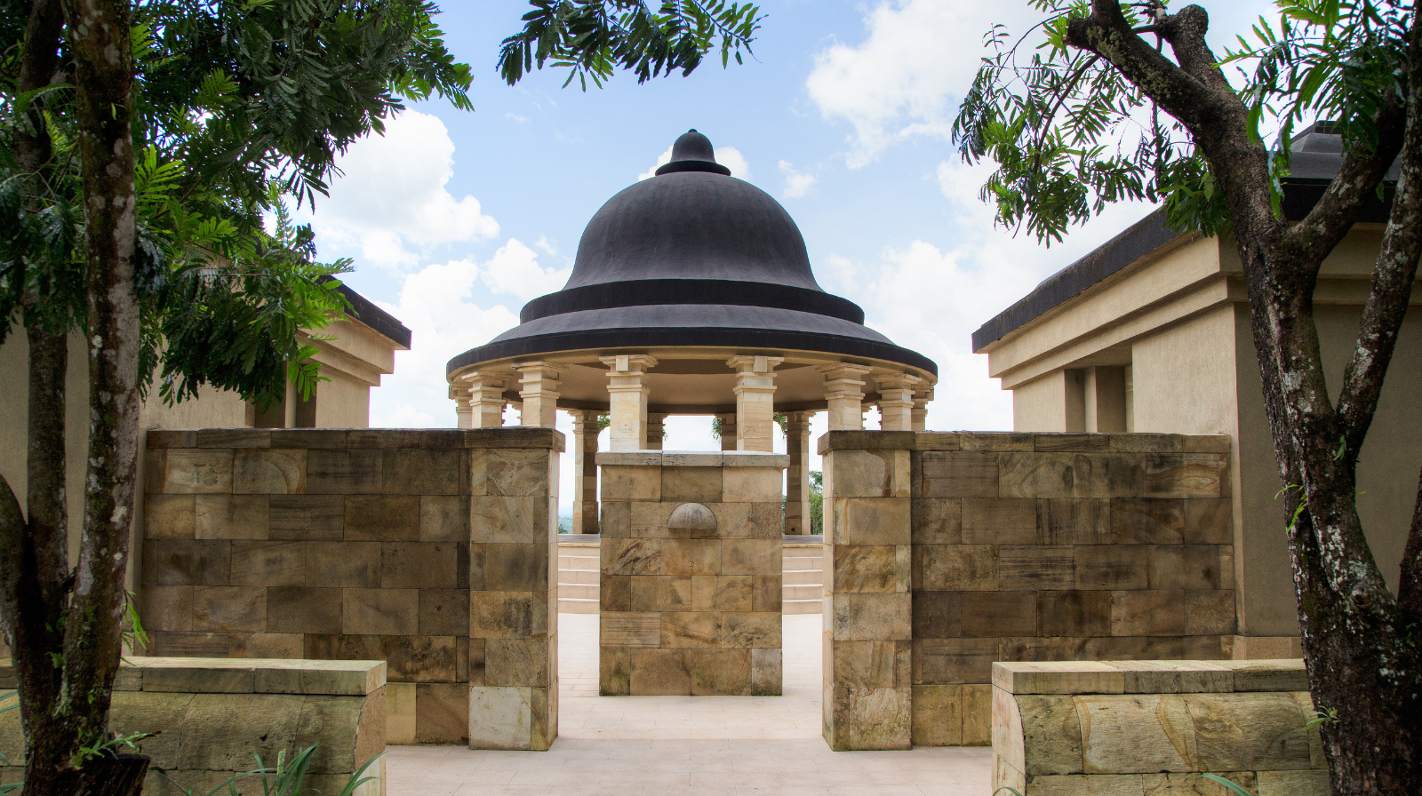 Stone temple pavilion with traditional Javanese architecture at Amanjiwo resort near Borobudur