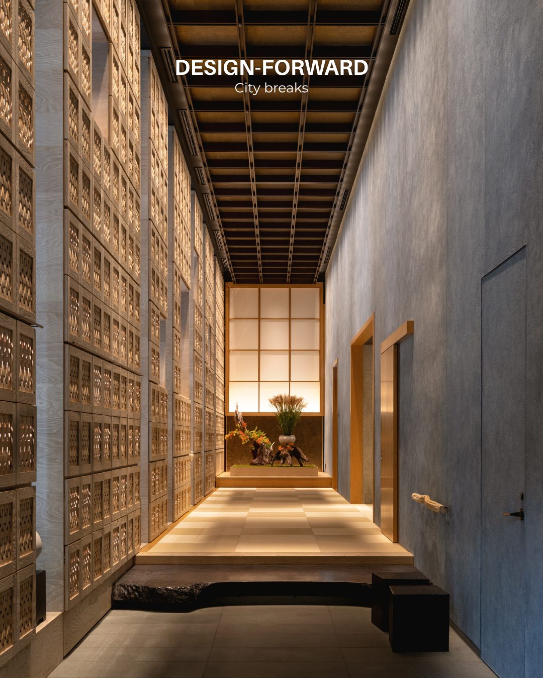 Entrance to Hoshinoya Tokyo hotel featuring a minimalist, design-forward hallway with soft lighting, natural materials, and a modern Japanese aesthetic.
