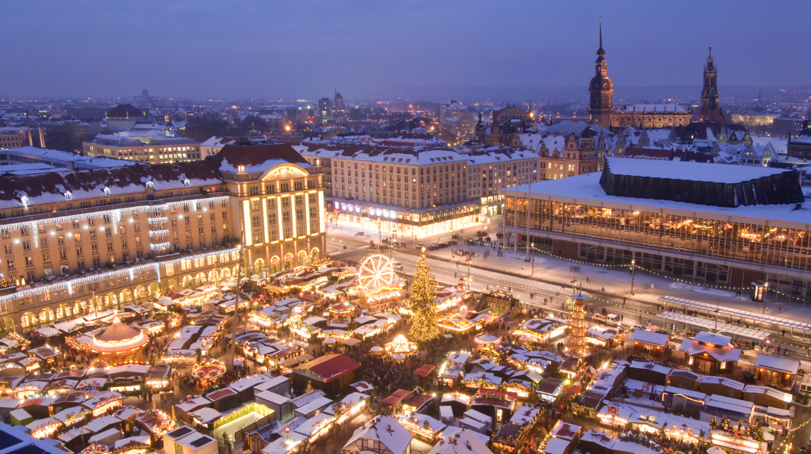 Nuremberg Christkindlesmarkt Christmas market aerial view with snow-covered stalls and ferris wheel in Bavaria, Germany