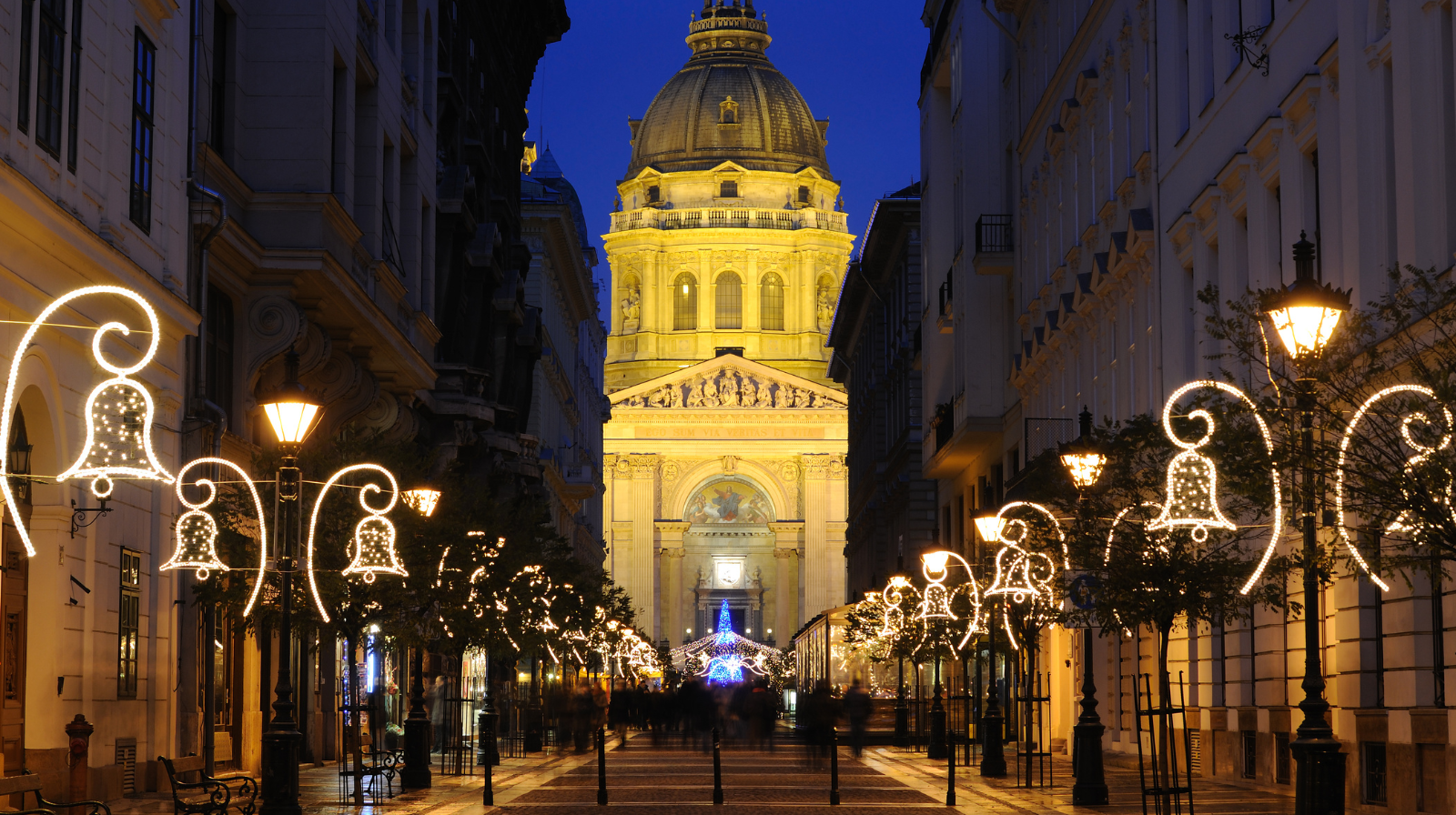 Budapest St. Stephen's Basilica illuminated with Christmas bell decorations at night in Hungary
