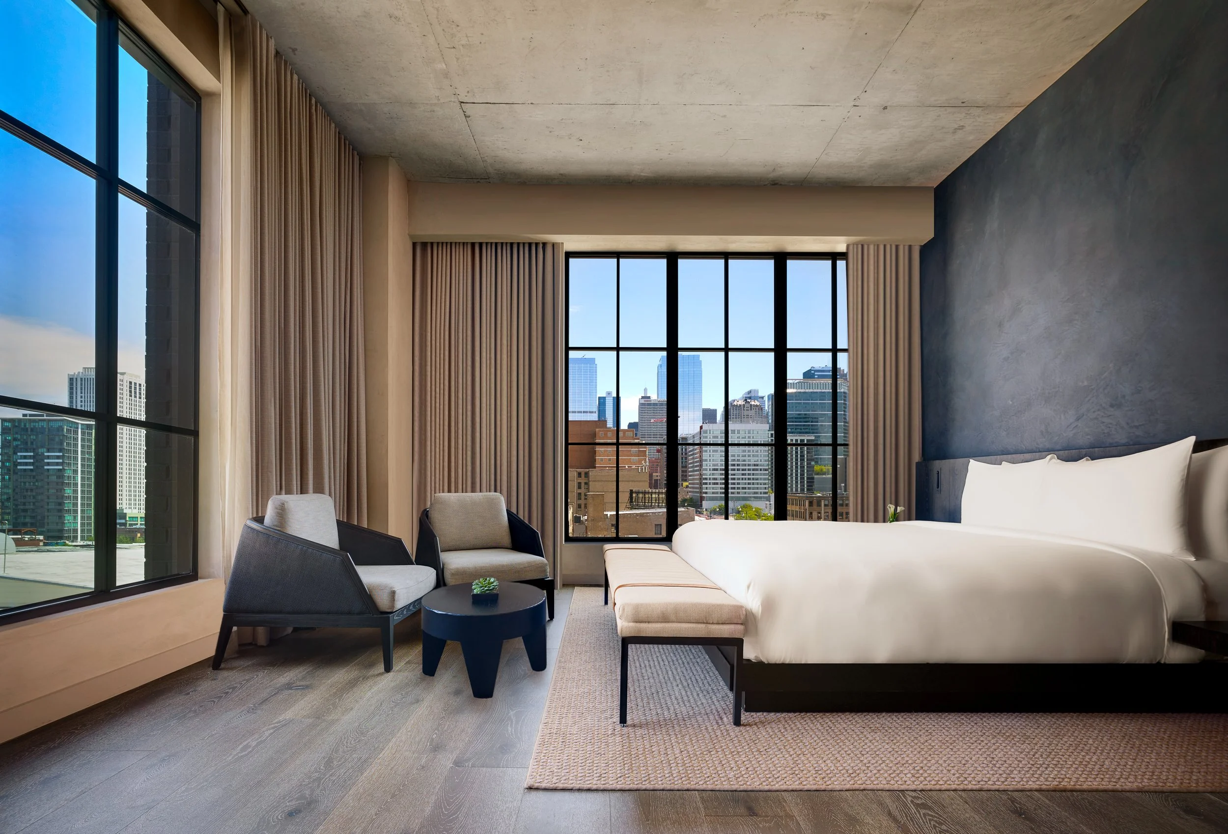Zen Deluxe room at Nobu Hotel Chicago in Illinois, featuring floor-to-ceiling windows, modern minimalist design, and panoramic city views—ideal for travelers seeking luxury accommodations in downtown Chicago.